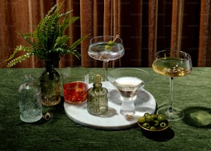 a table with glasses and objects on it