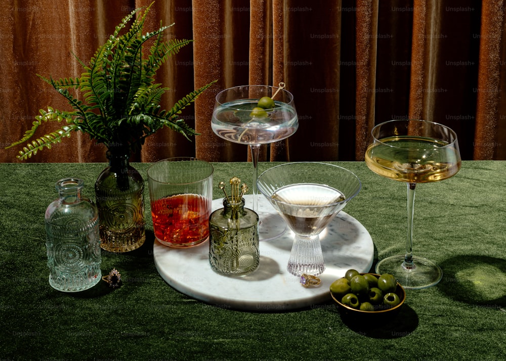 a table with glasses and objects on it