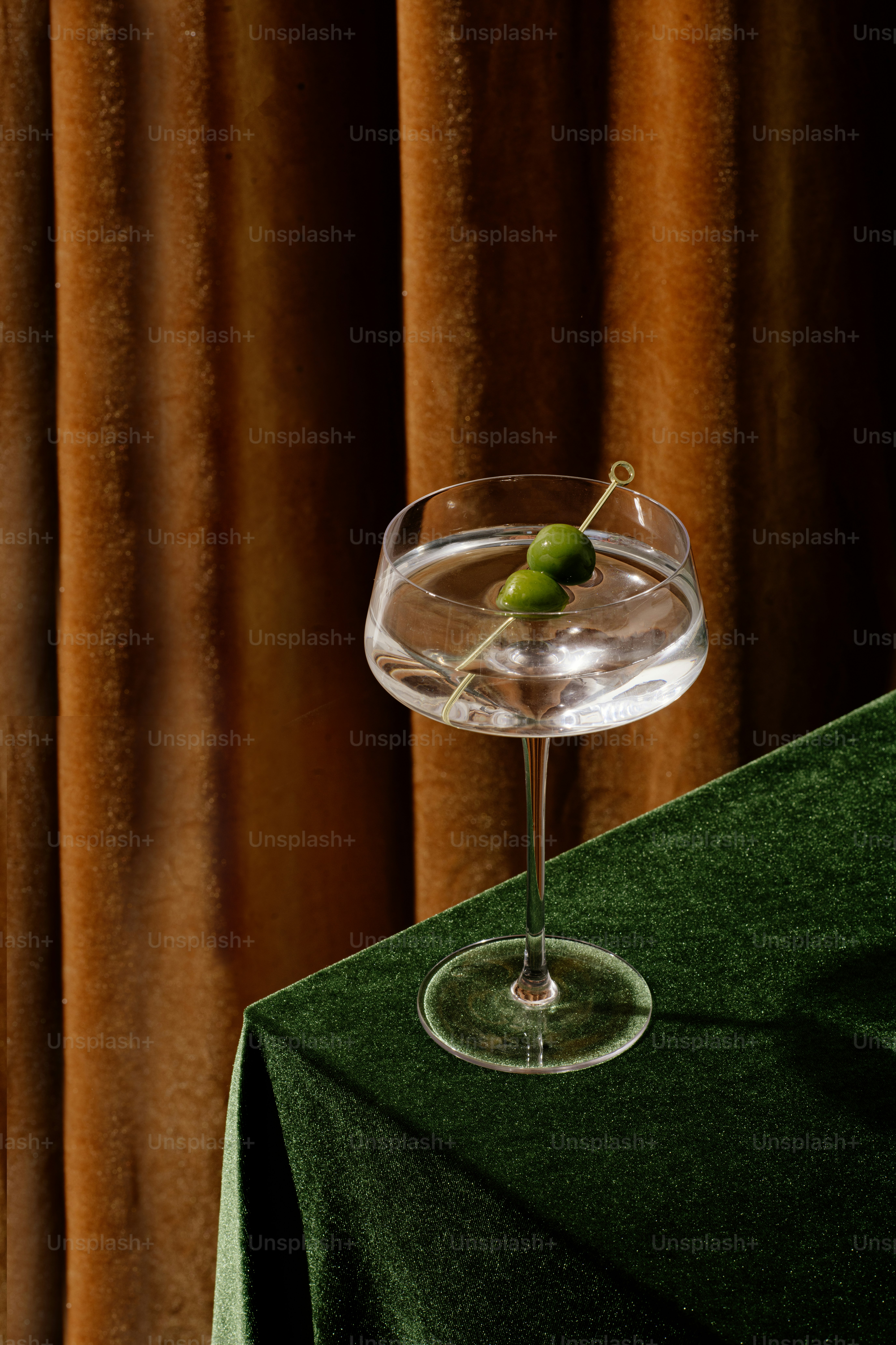 a glass with a drink in it