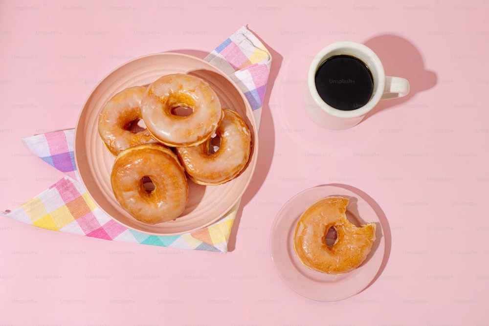 a plate of donuts and coffee
