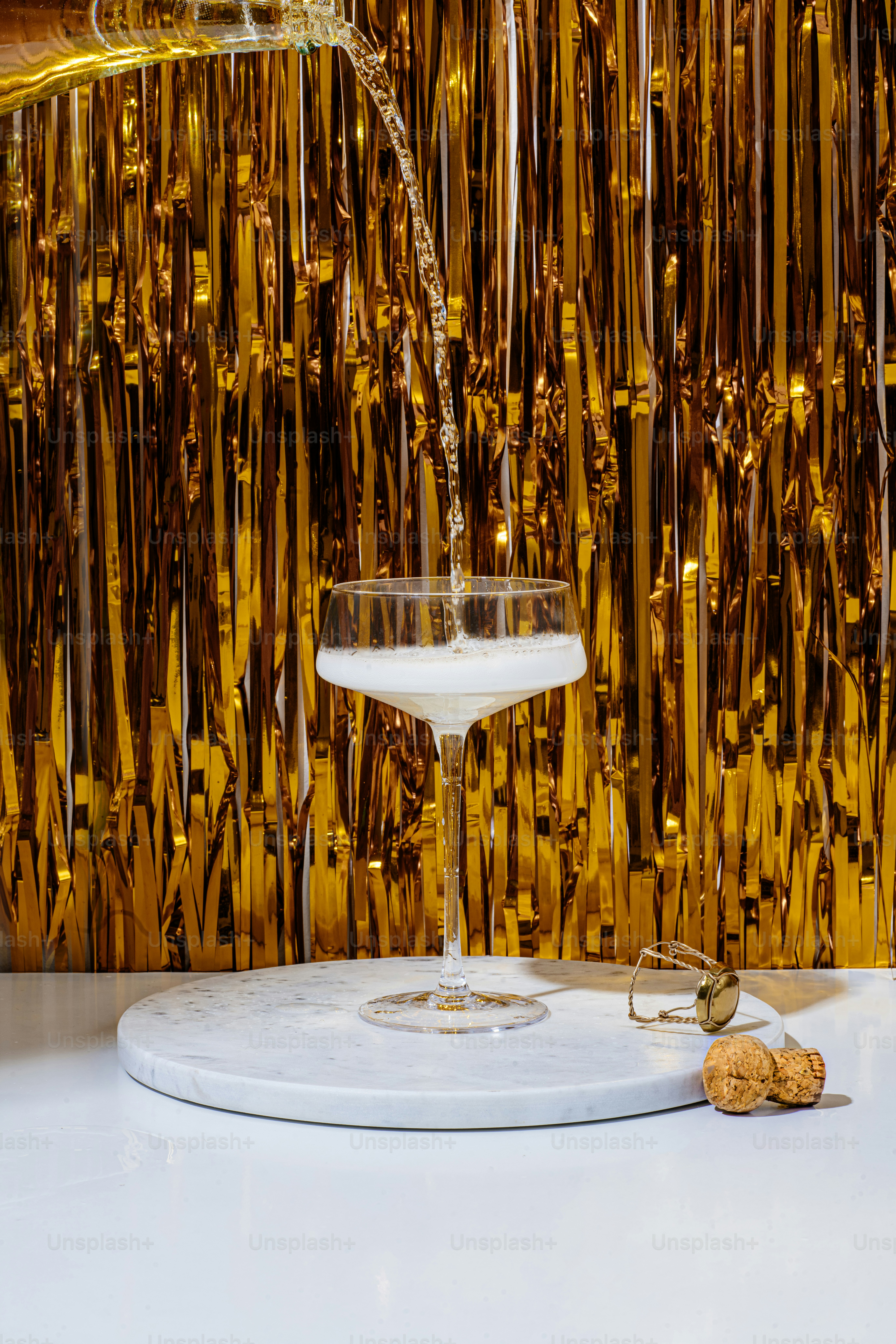 a glass of liquid on a table