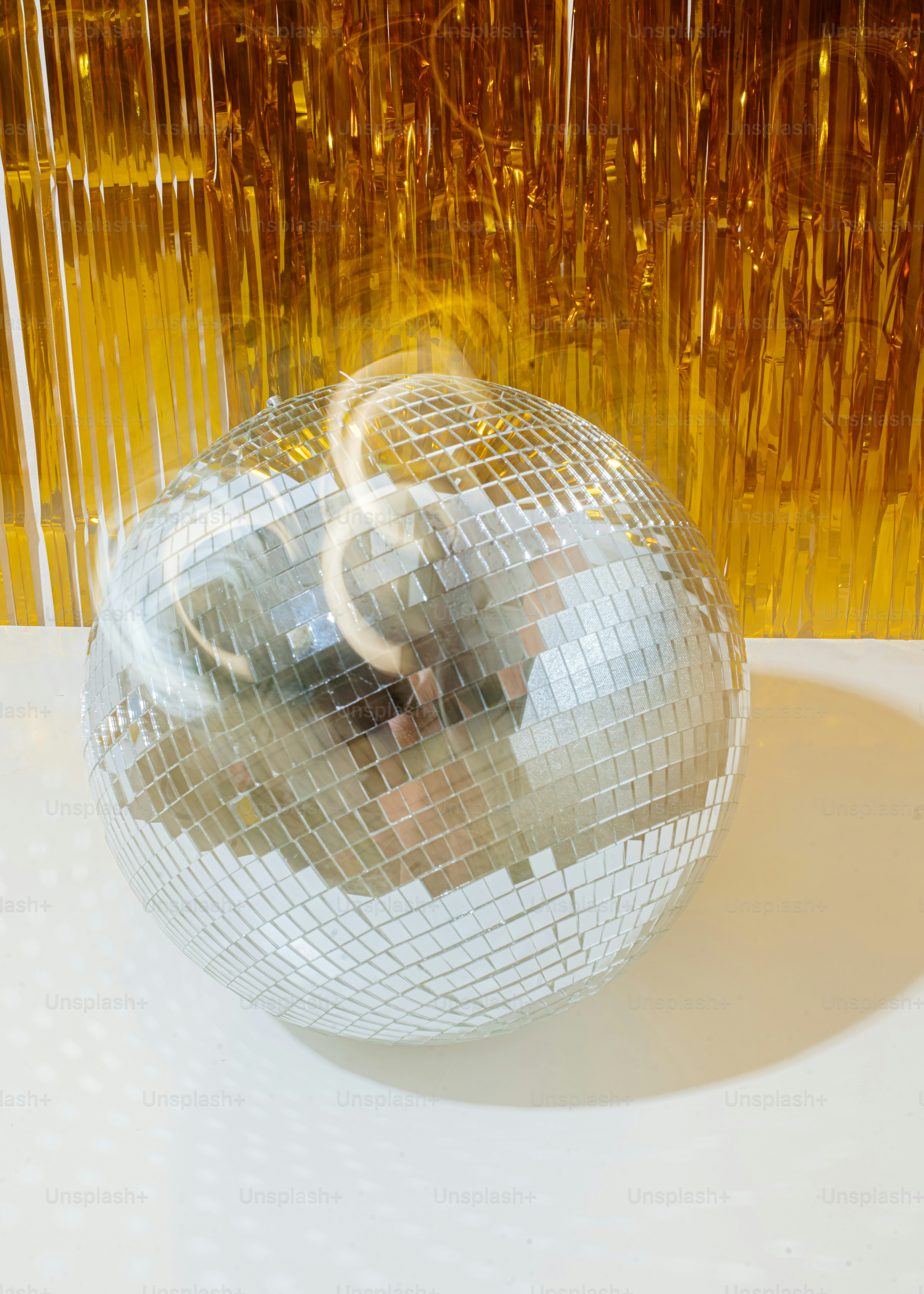 a white ball on a white surface
