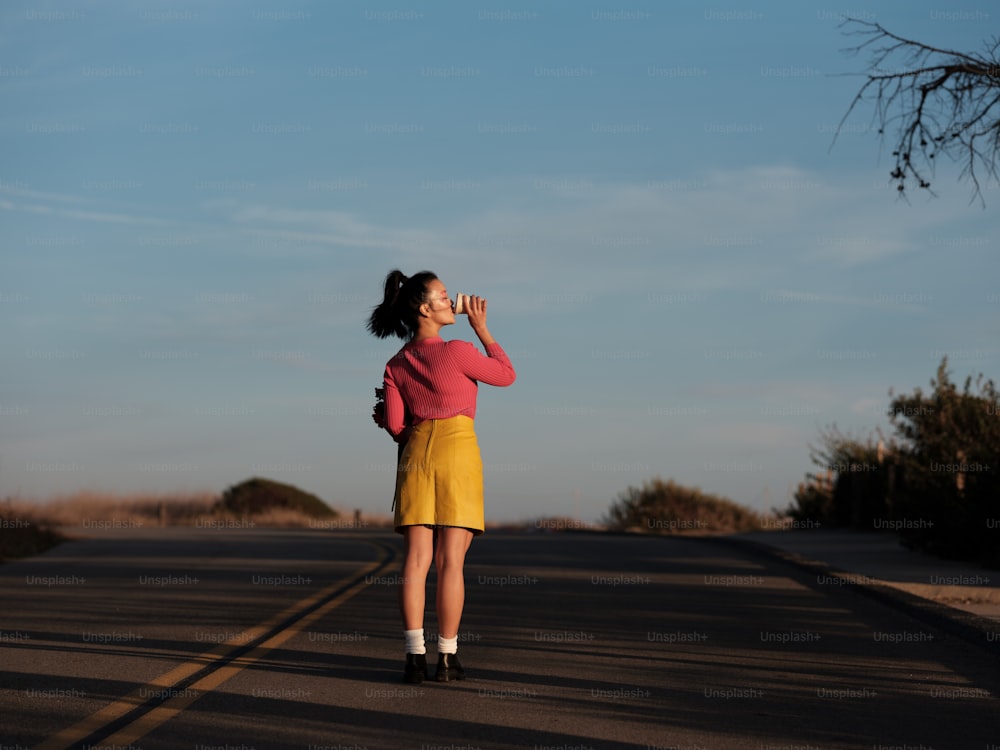 a person standing on a road