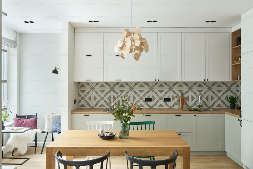 a kitchen with white cabinets