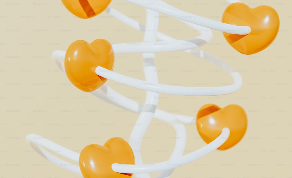 a group of orange and white balloons