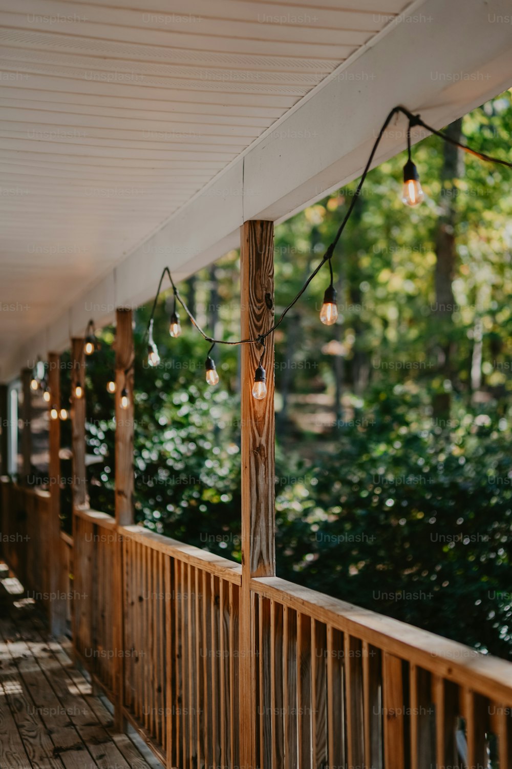 a wooden bridge with lights