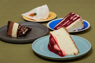 a group of cakes on plates
