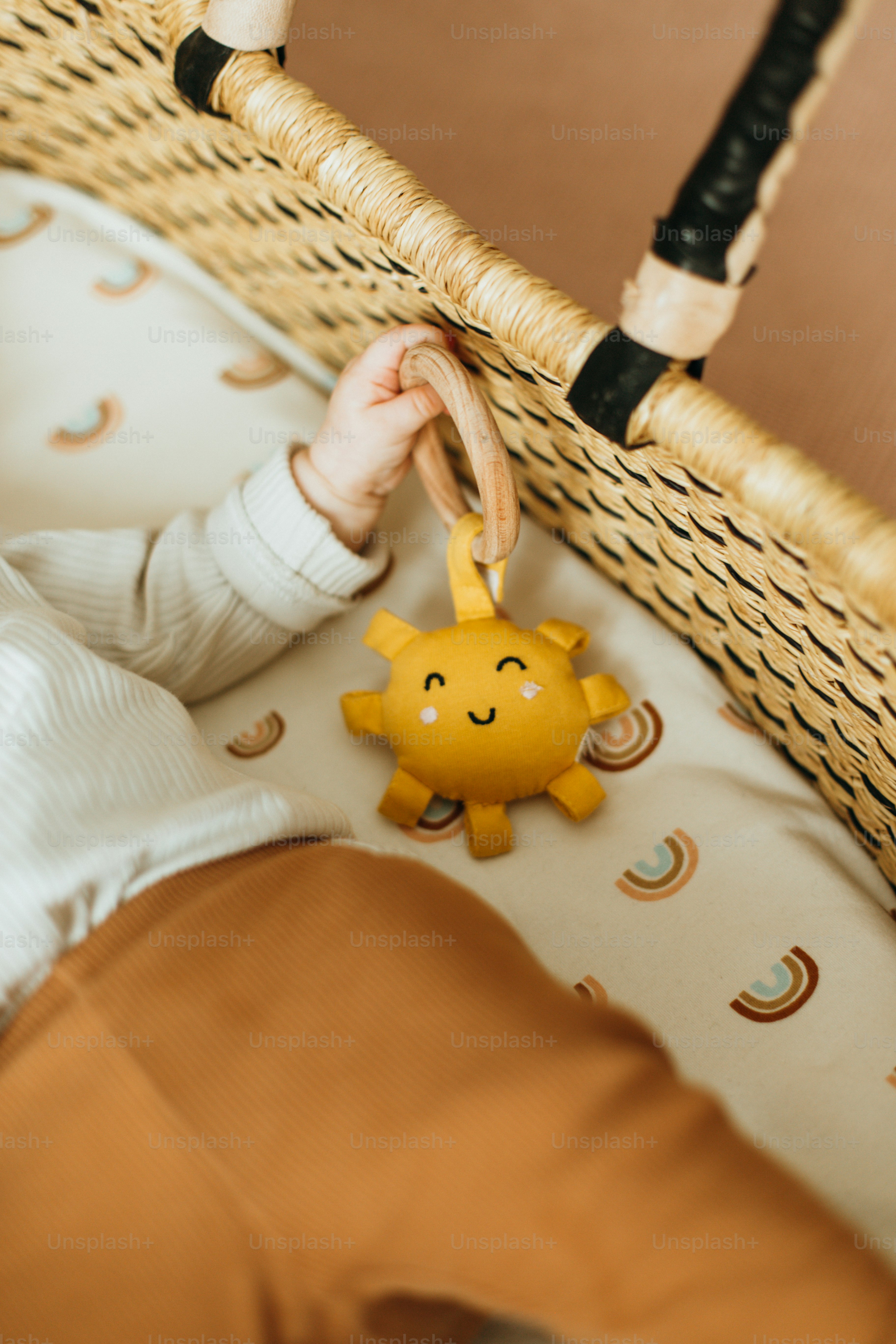 a hand holding a toy