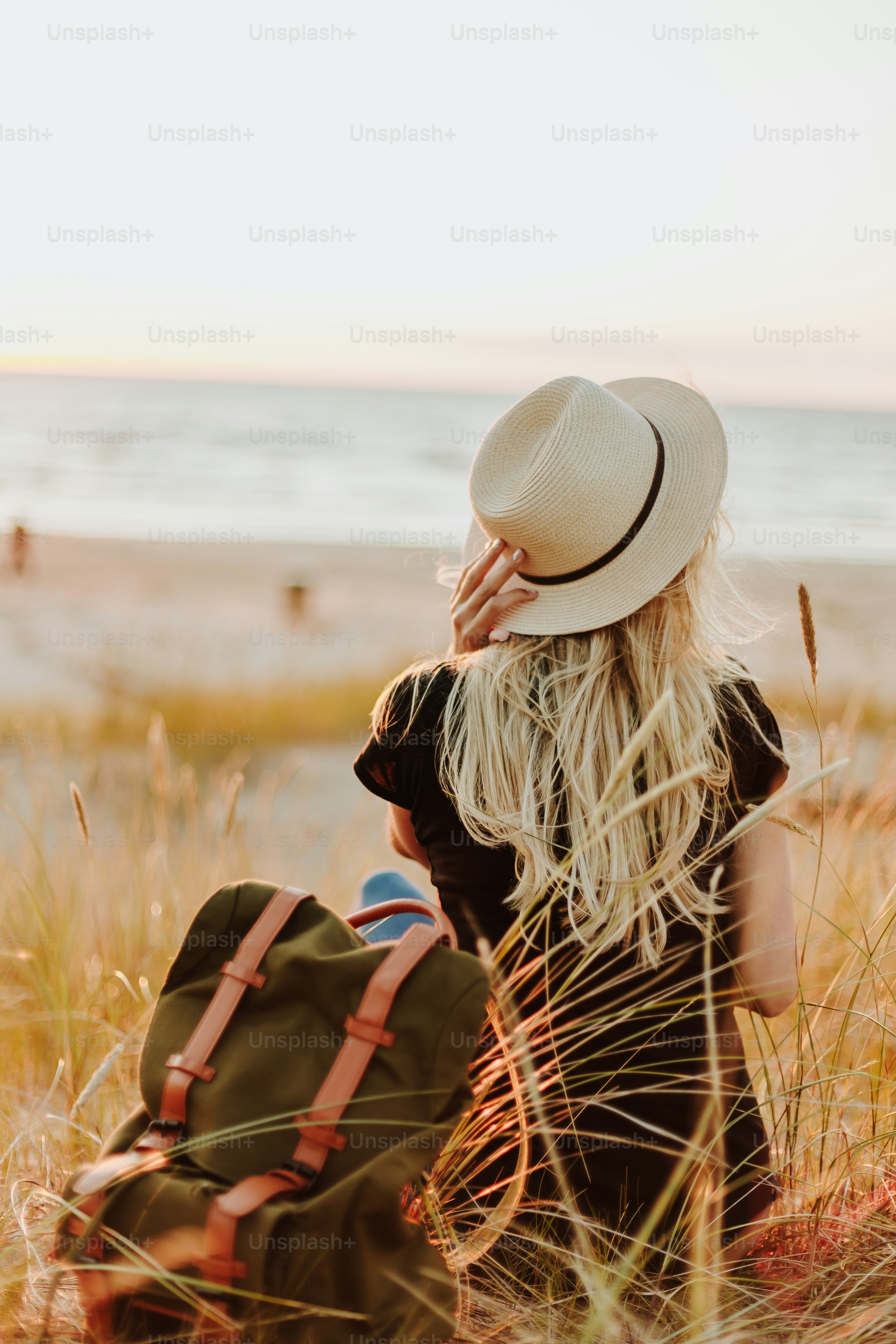 a person sitting on a beach
