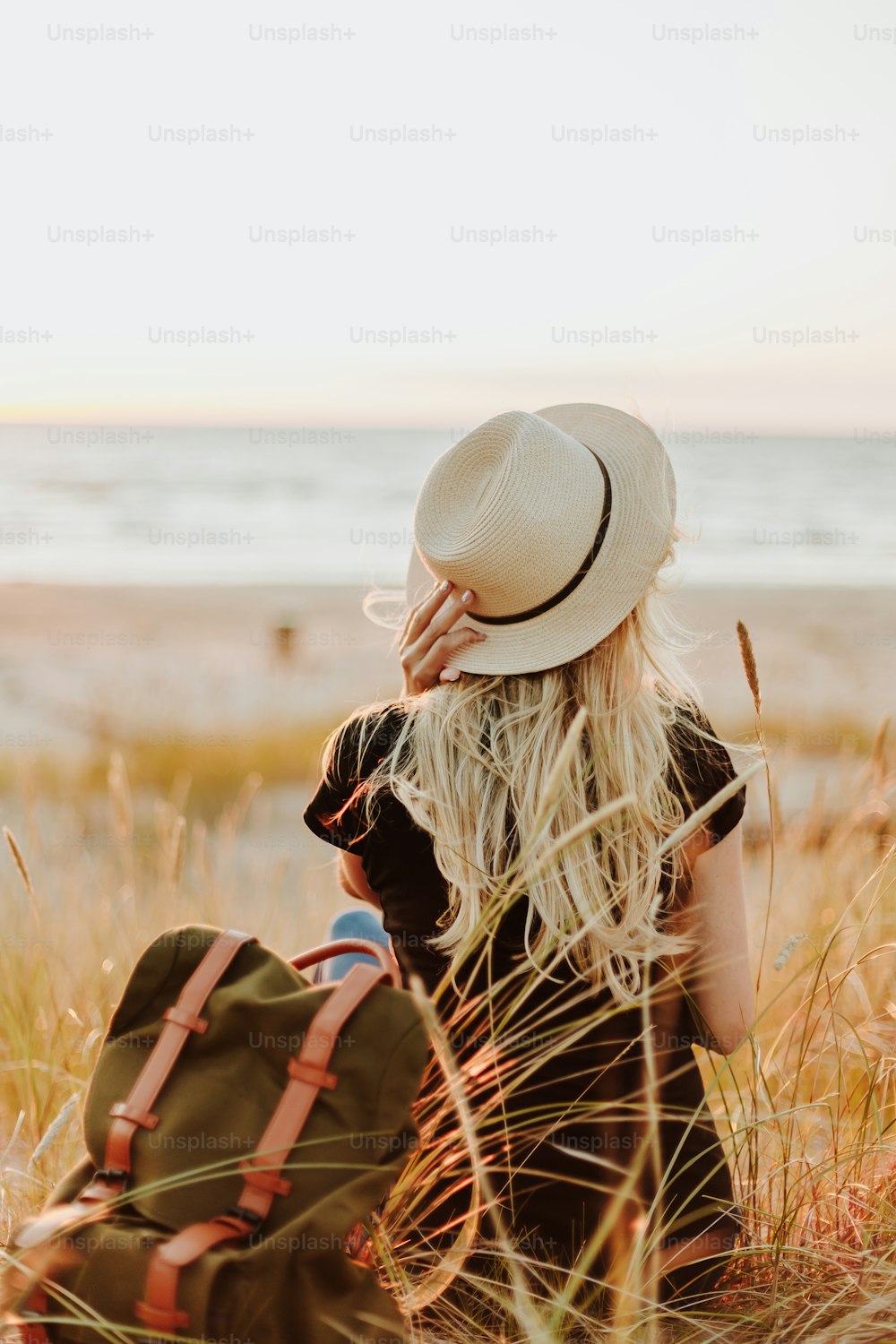 a person sitting in a field