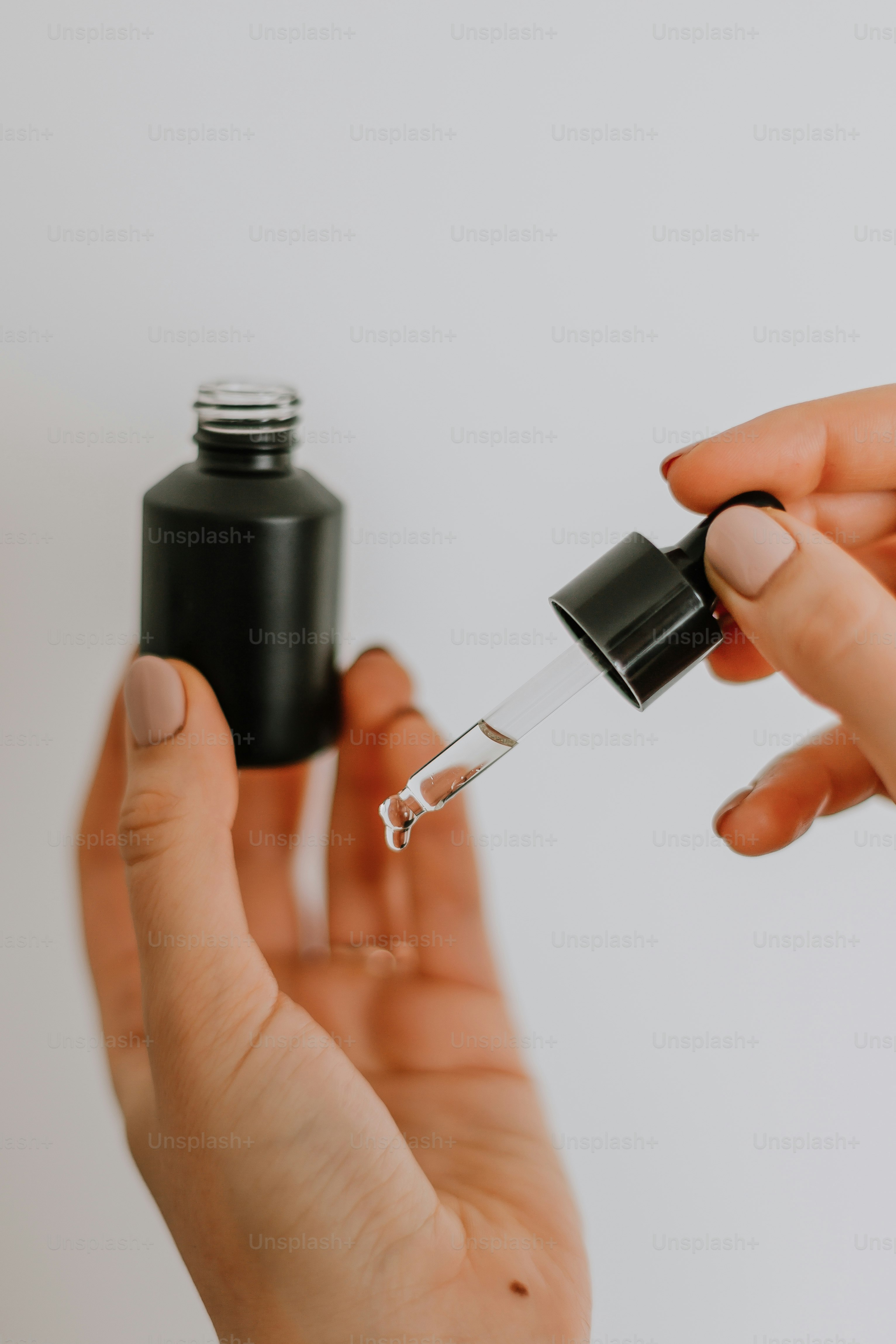 a person holding a syringe