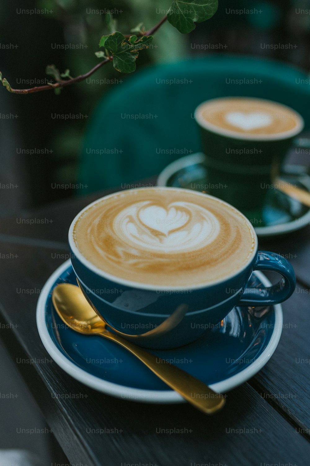 a cup of coffee with a spoon