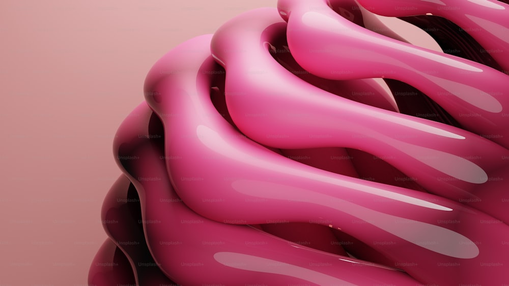 a close up of a pink object
