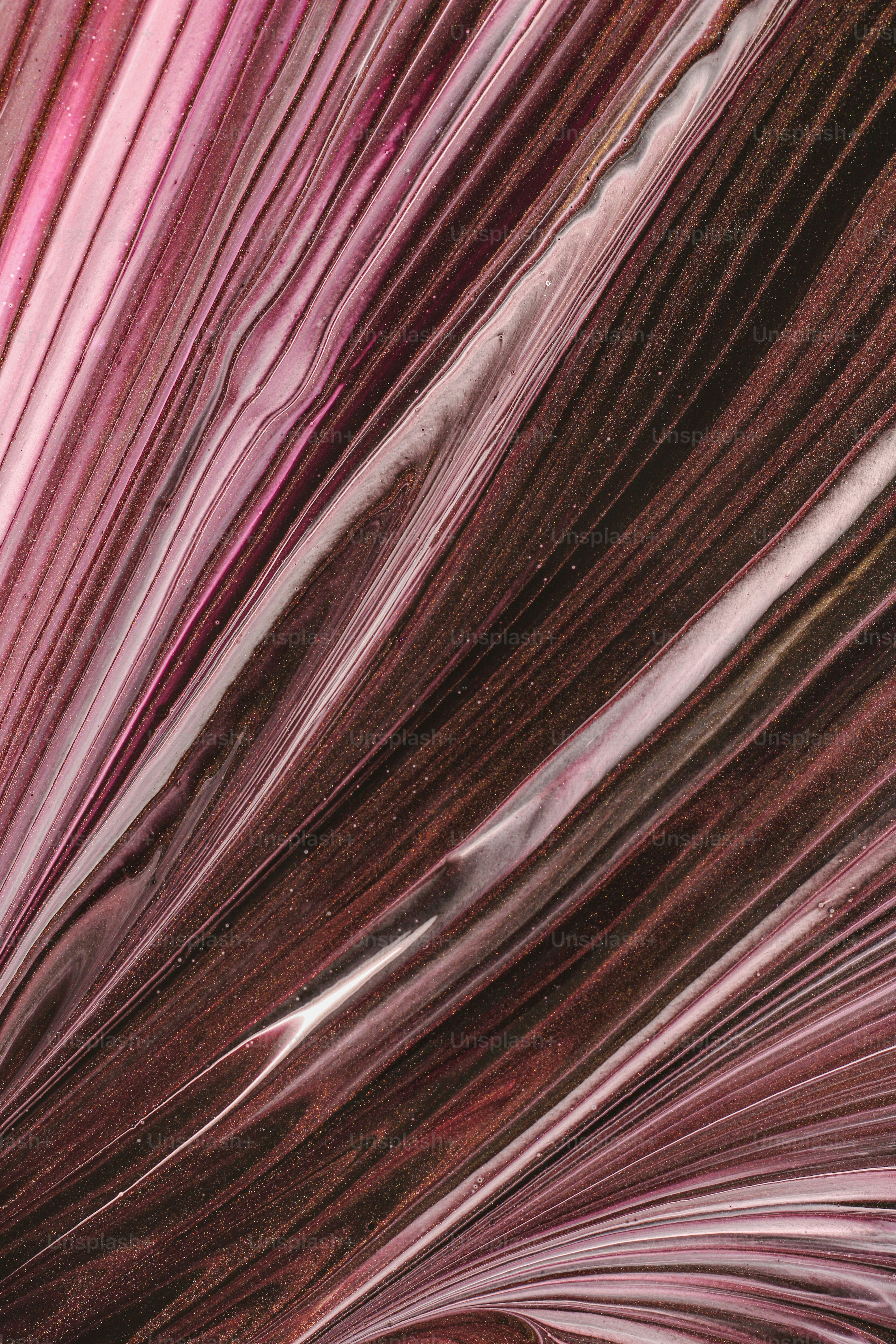 A close up of a red and white striped fabric photo Rose gold