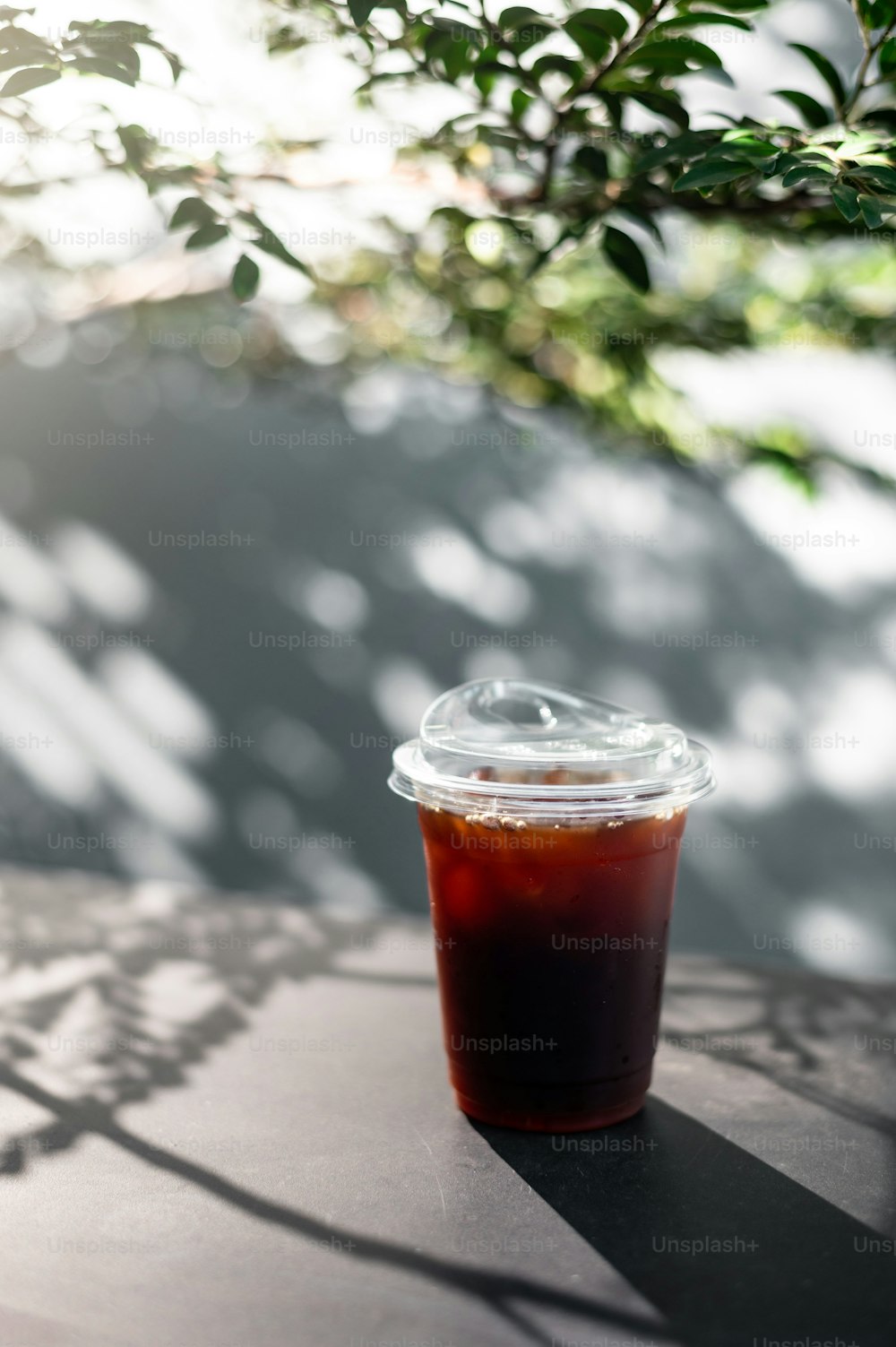 a glass of red liquid