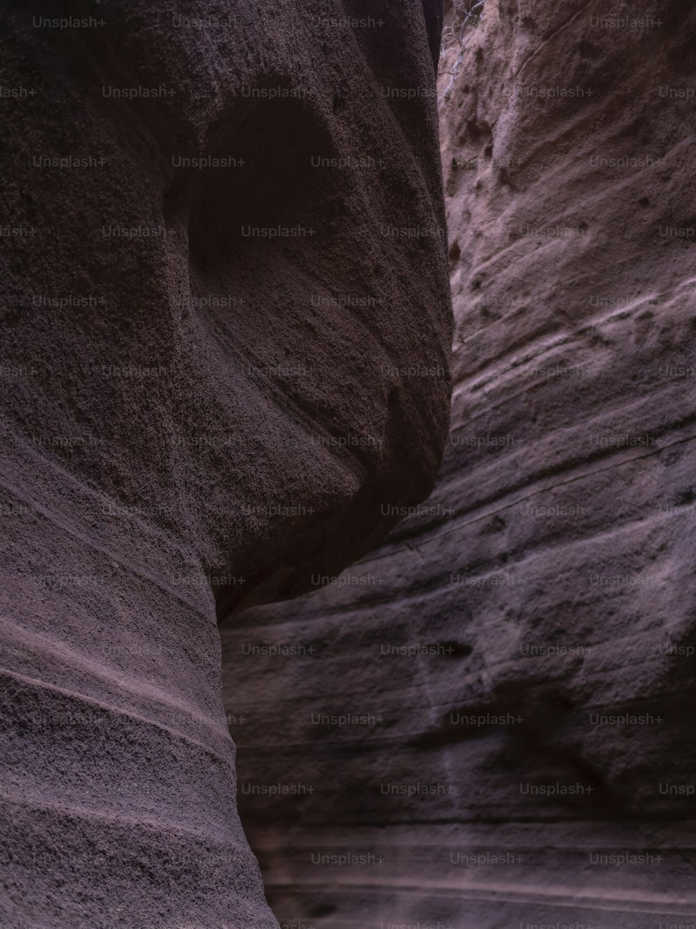 a rock formation with a hole in it