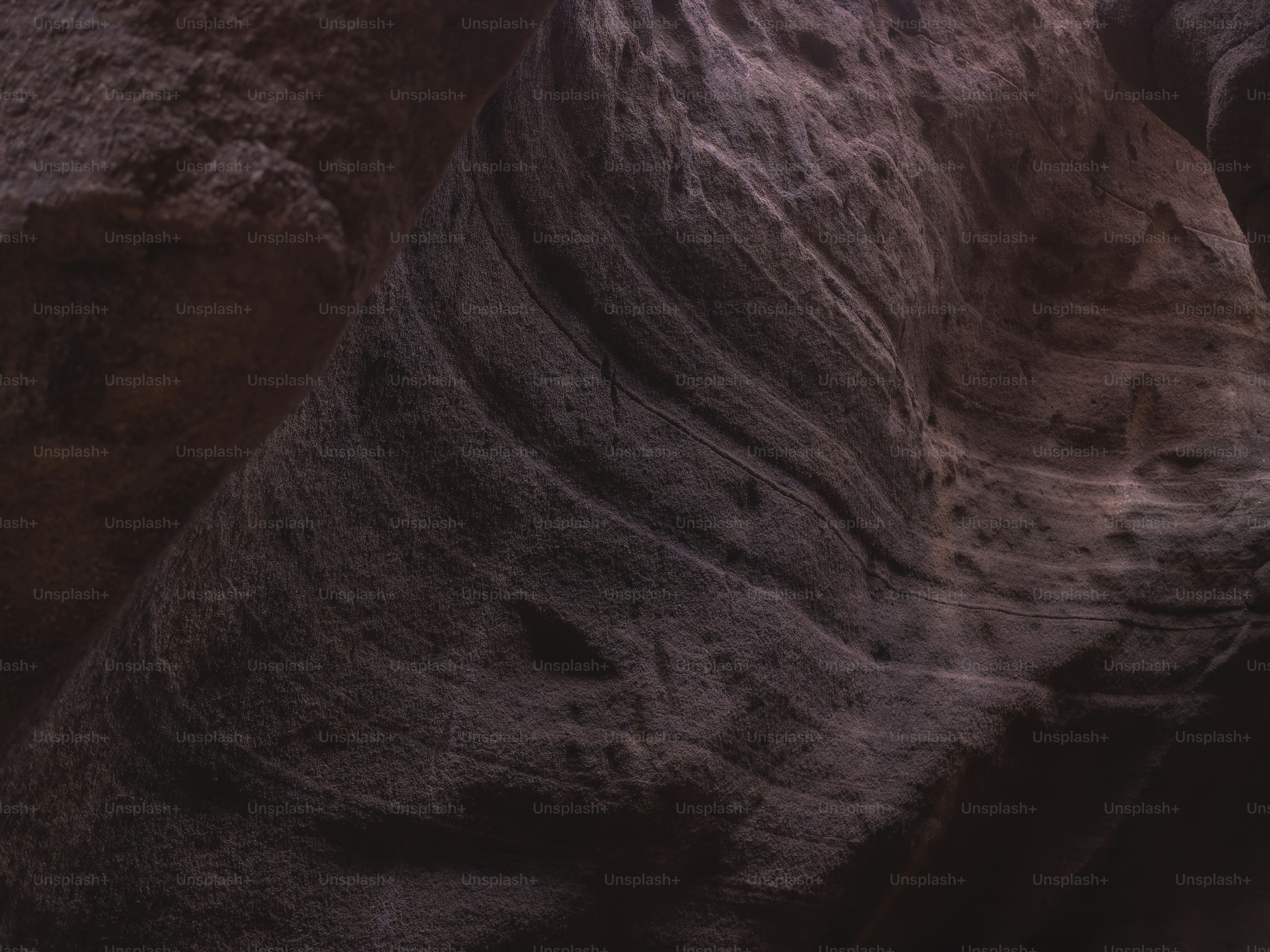 a narrow slot in the side of a mountain