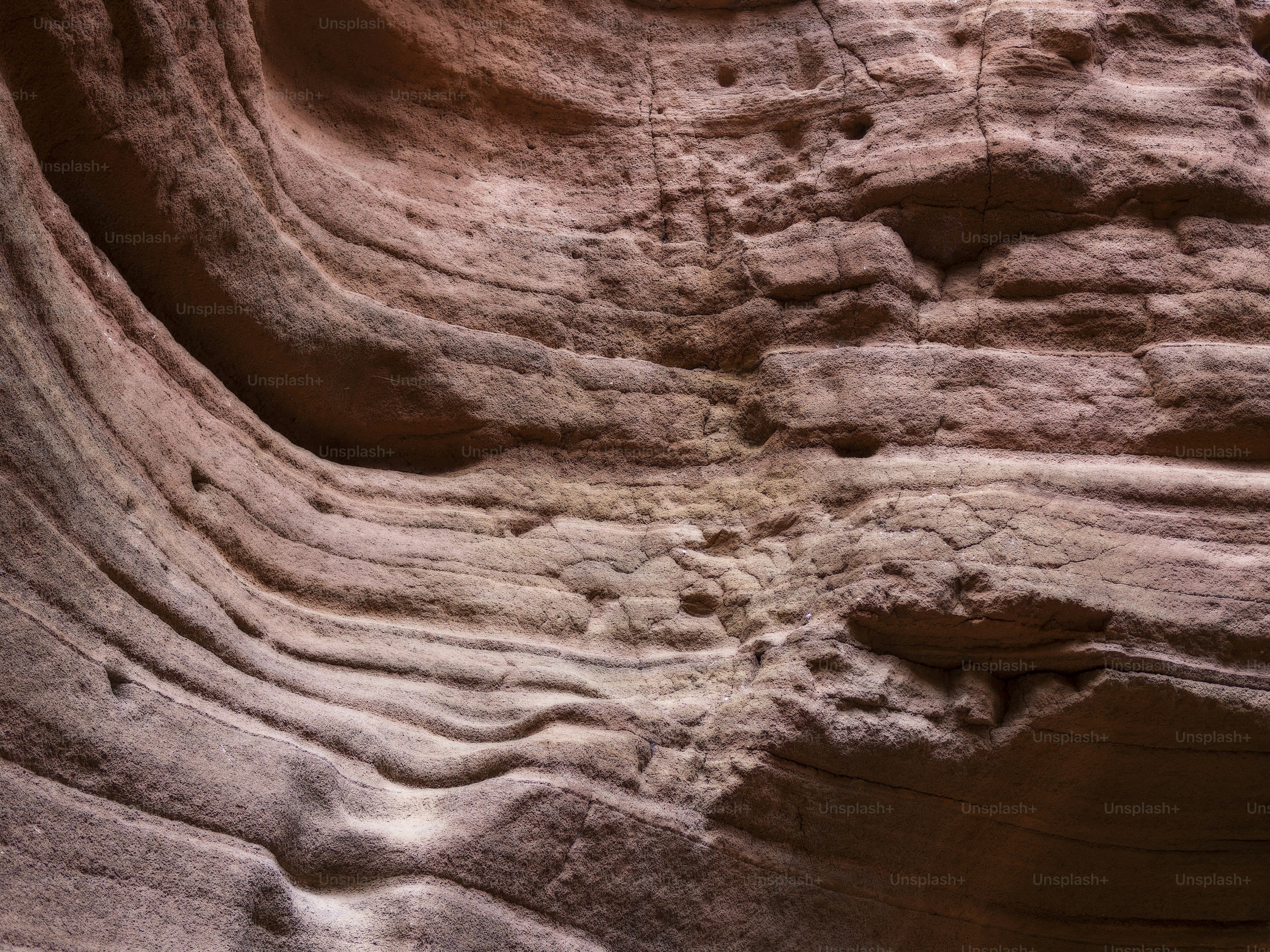 a rock formation with a hole in it