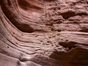 a rock formation with a hole in it