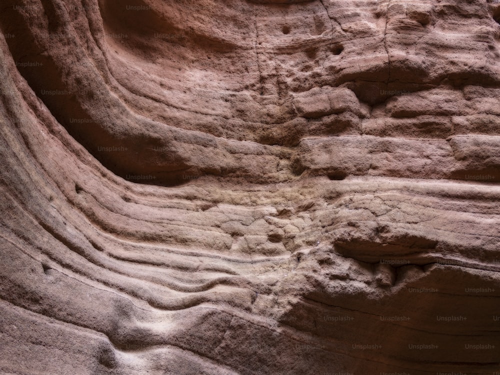 a rock formation with a hole in it