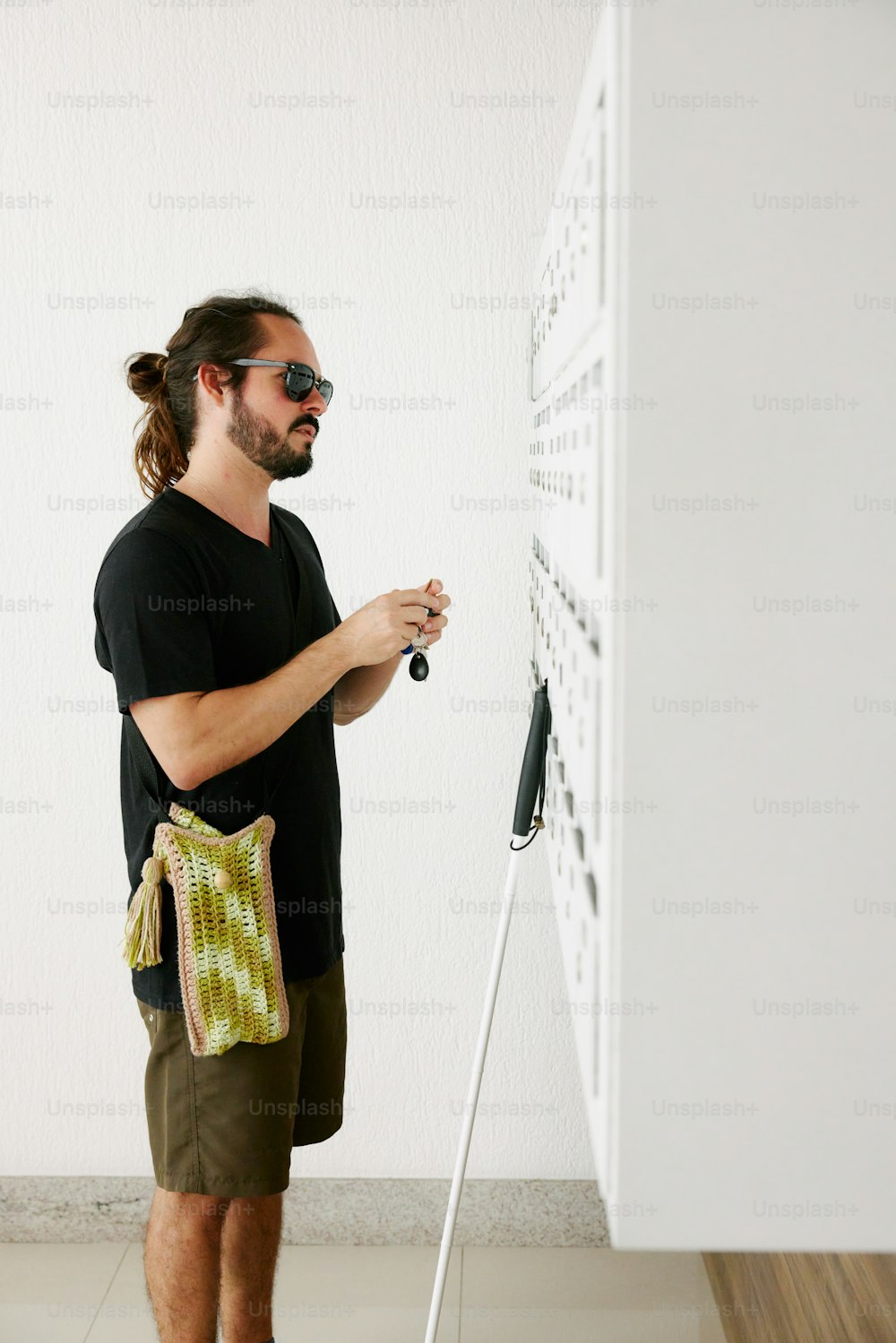 a man standing in front of a white board