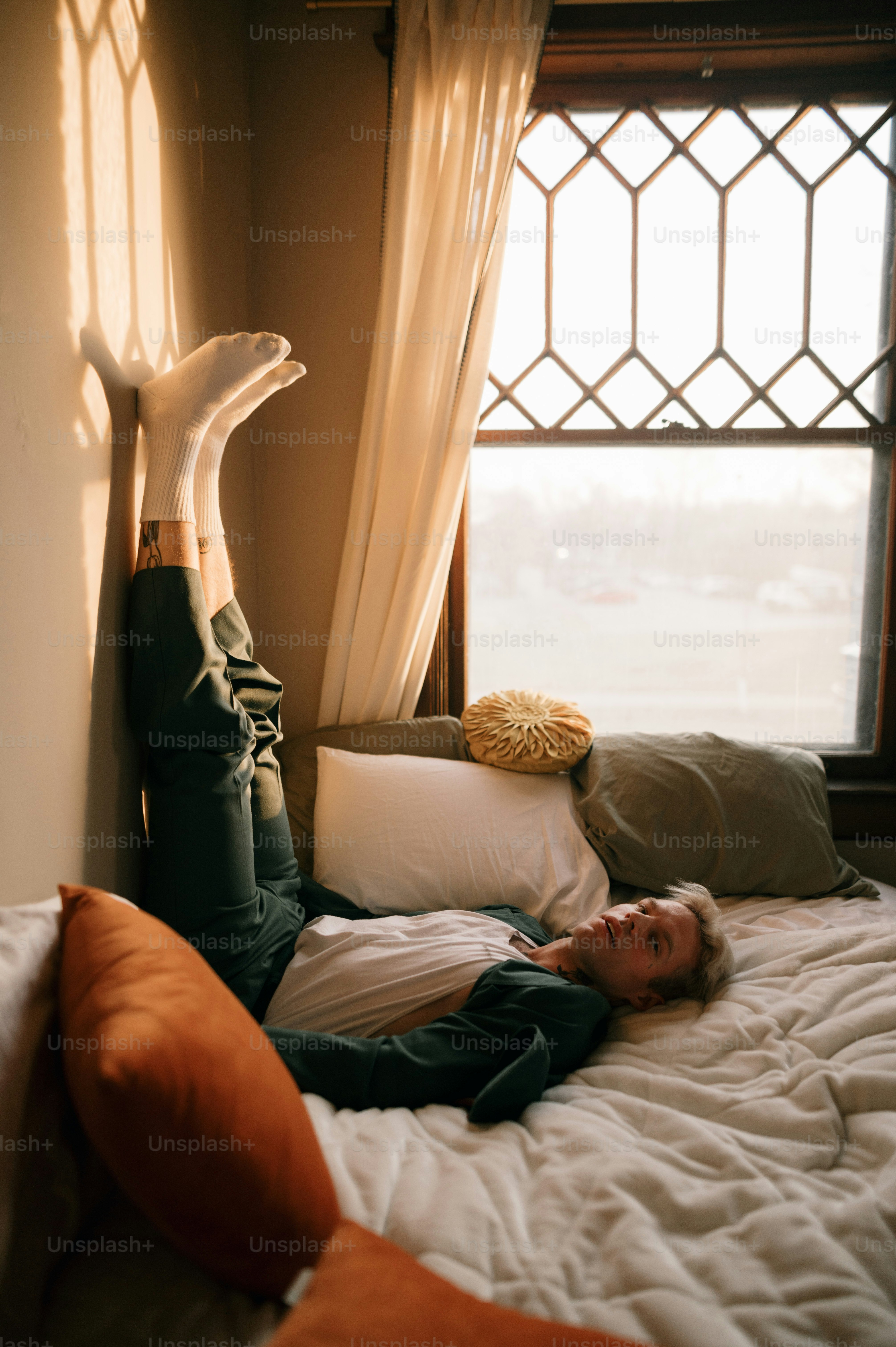 a person lying on a bed