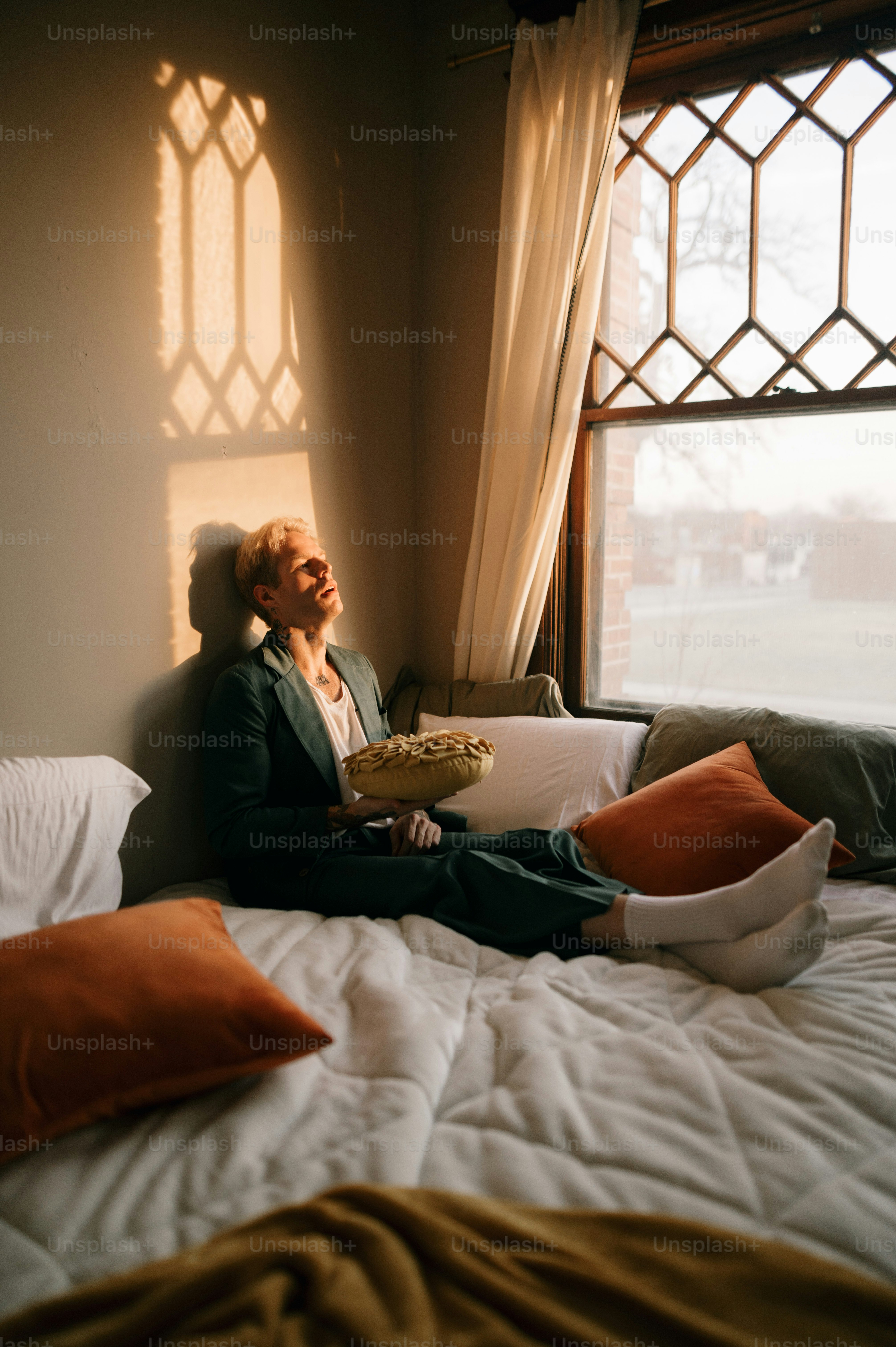 a person sitting on a bed