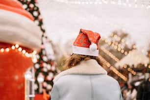 a person wearing a hat and scarf