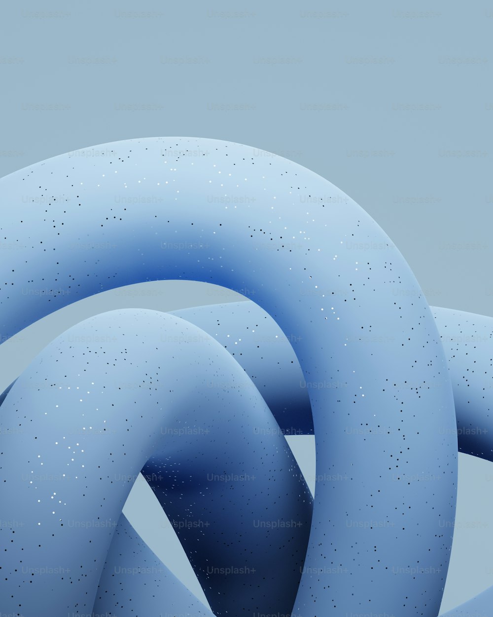 um grande objeto azul com um monte de bolhas sobre ele