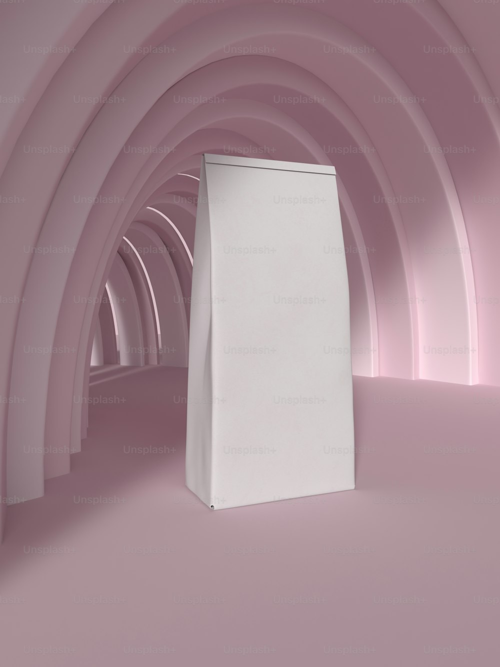 a white cylinder in a room