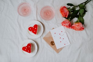 a group of red and white flowers