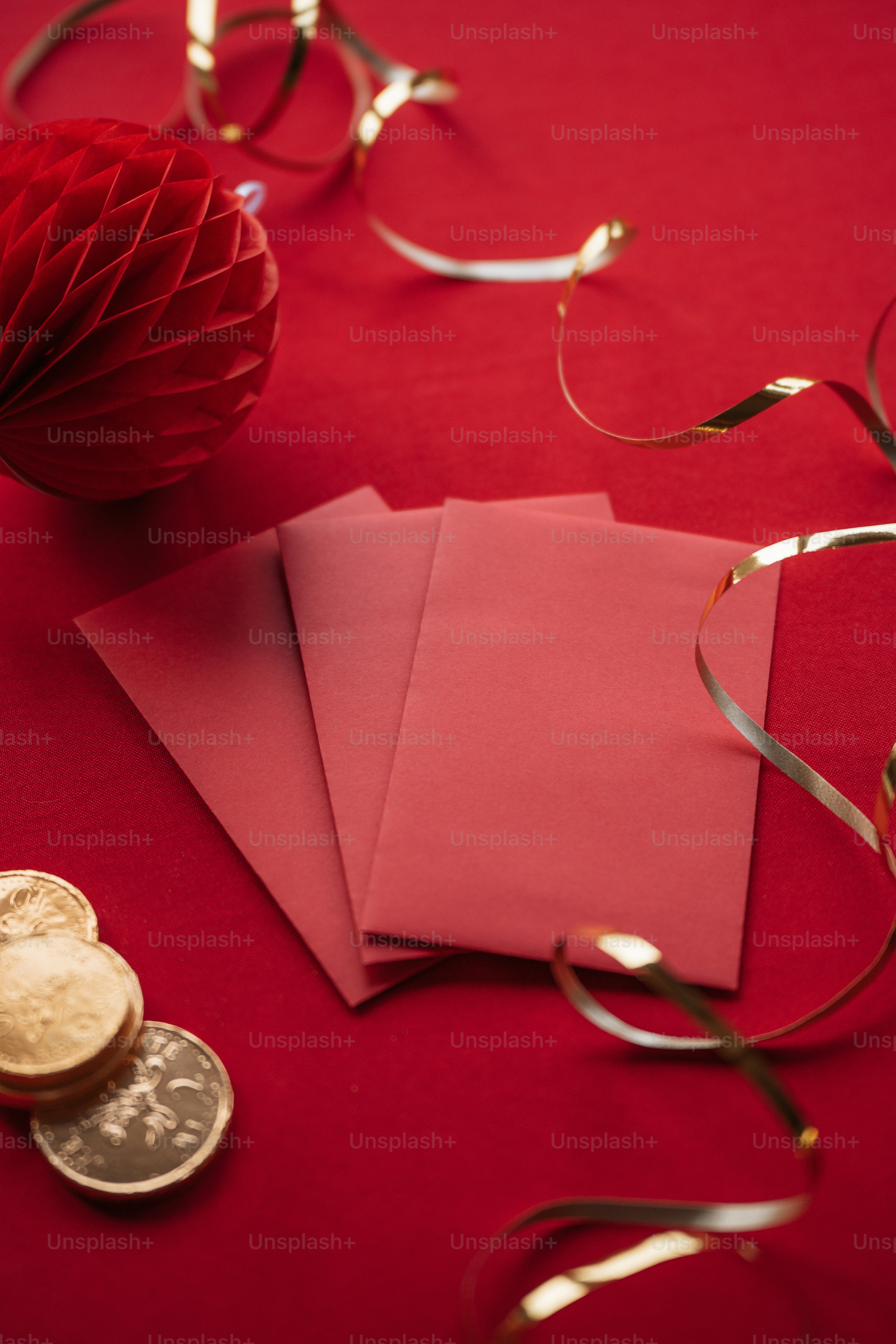 a pink napkin on a red table