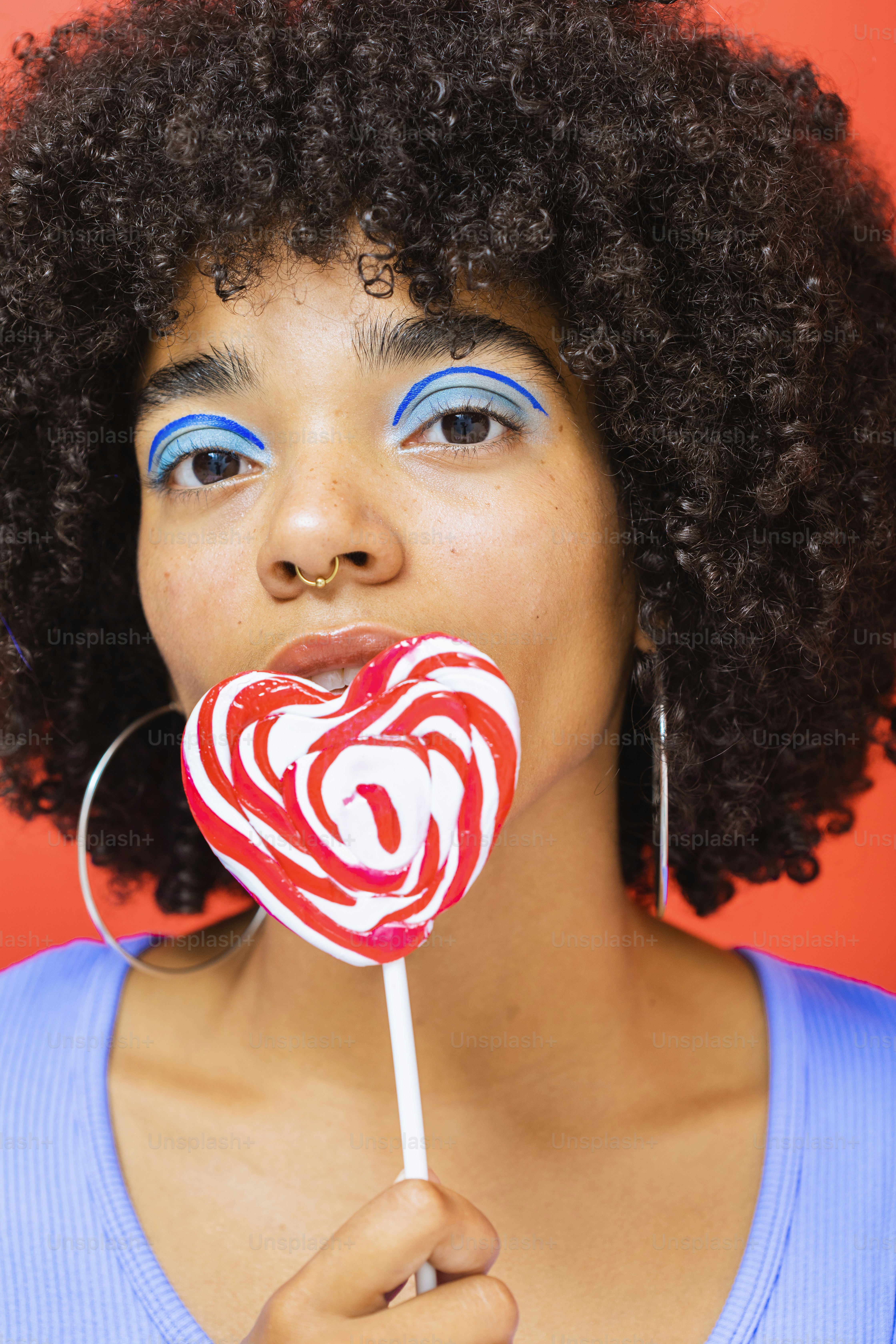 A person drinking from a straw photo Eye makeup Image on Unsplash