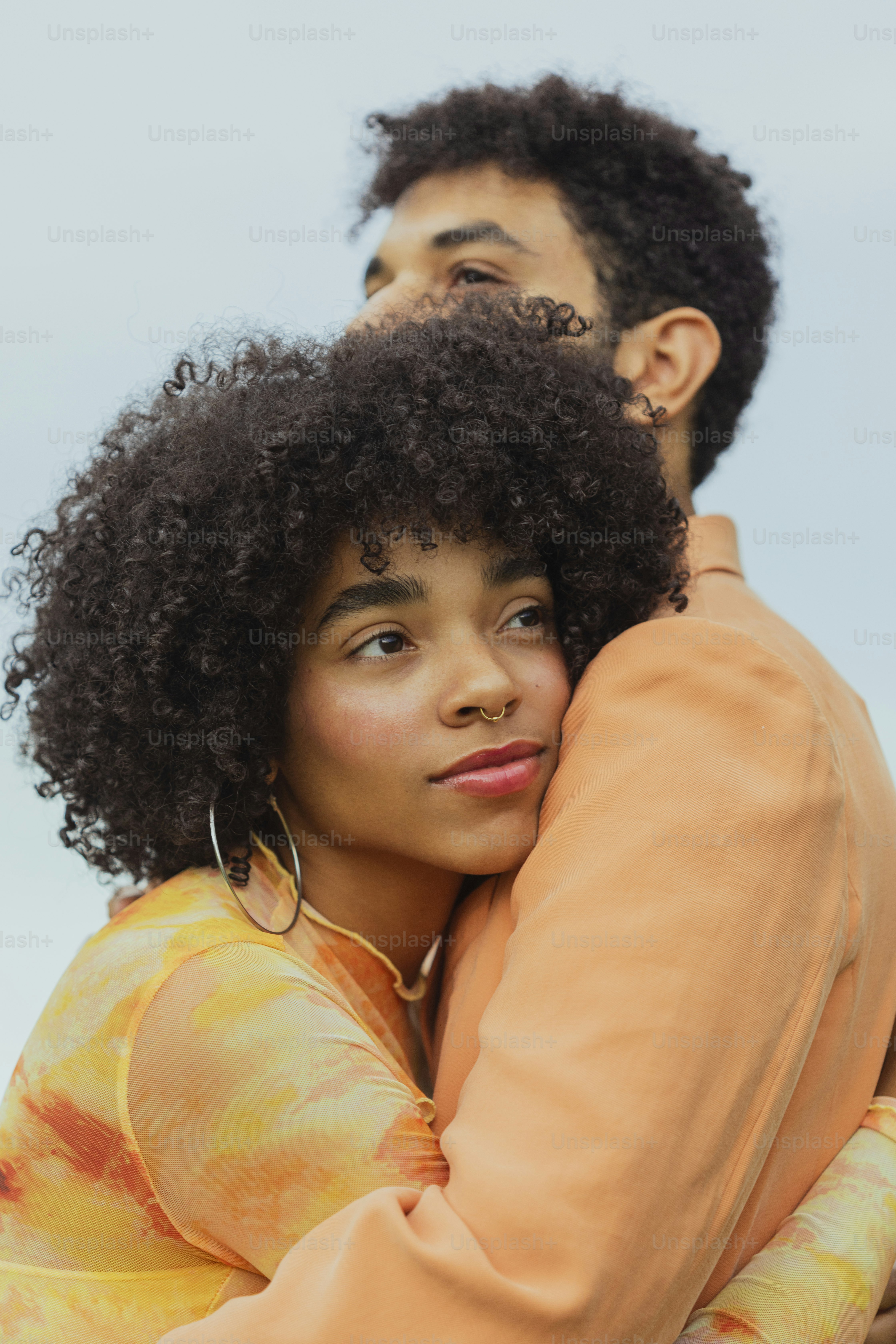 a man hugging a woman