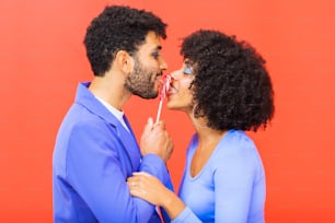 a man and woman kissing