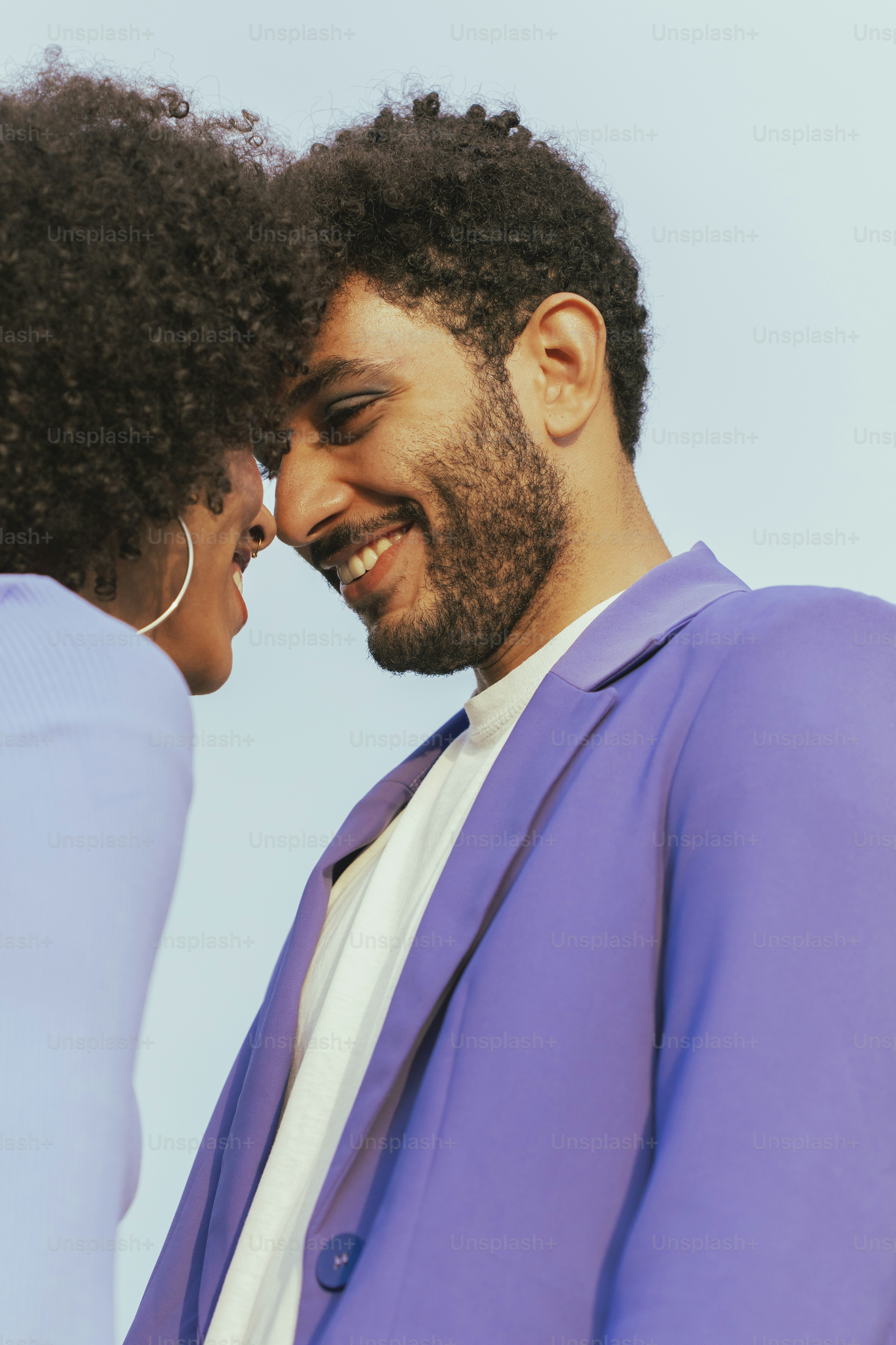 a man and woman kissing