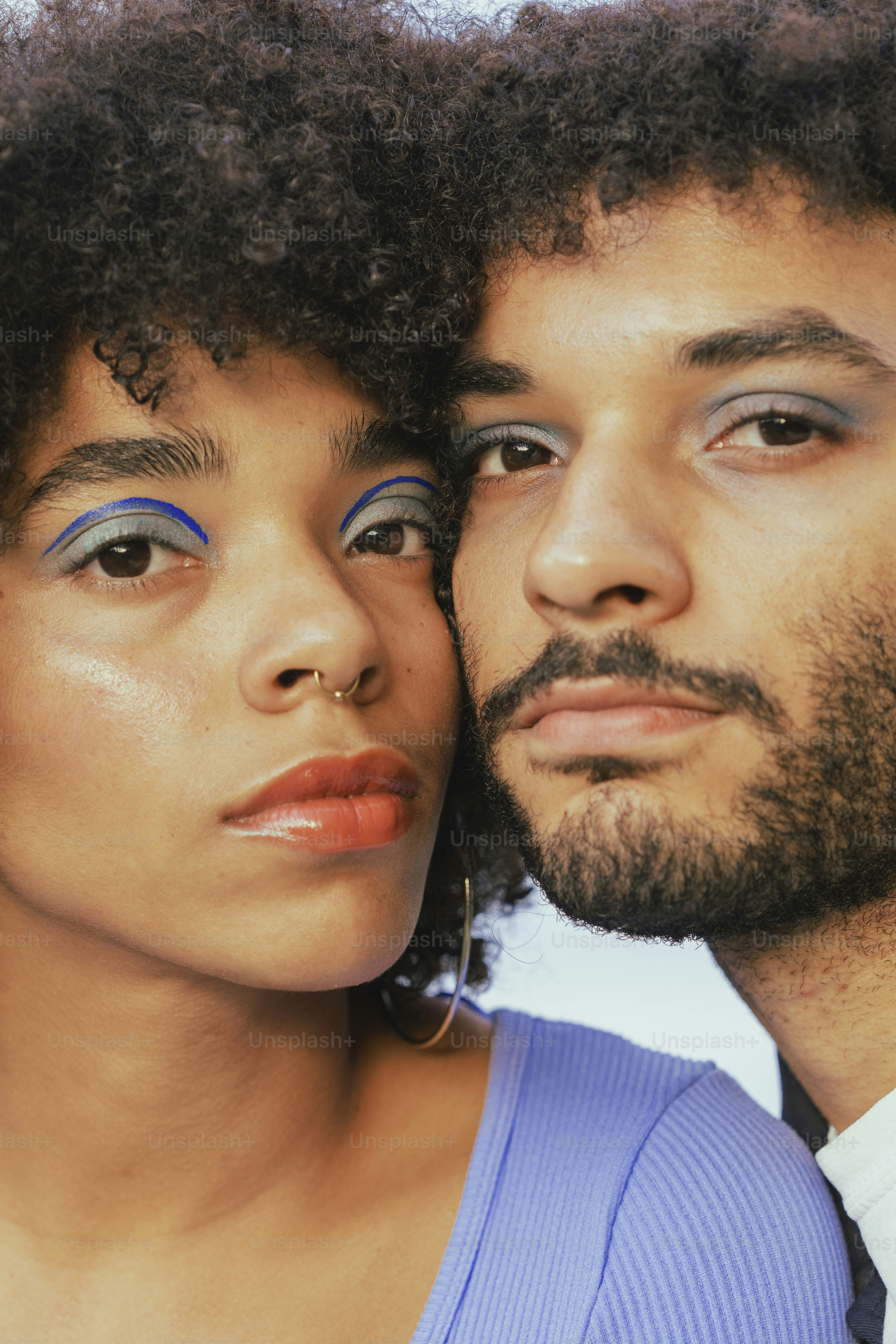 a man and woman taking a selfie