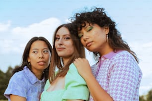 a group of women posing for a photo