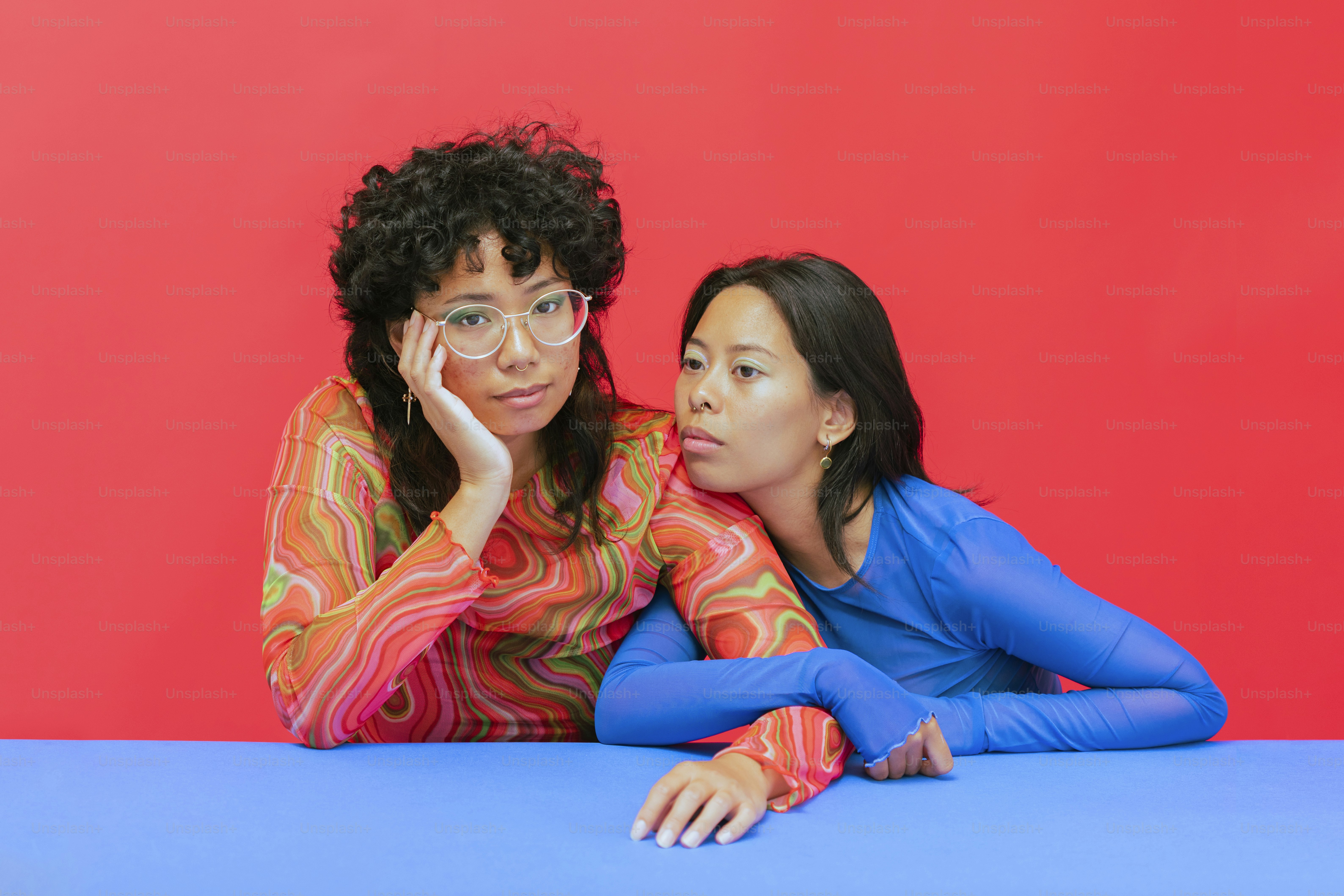 a person and a girl sitting at a table