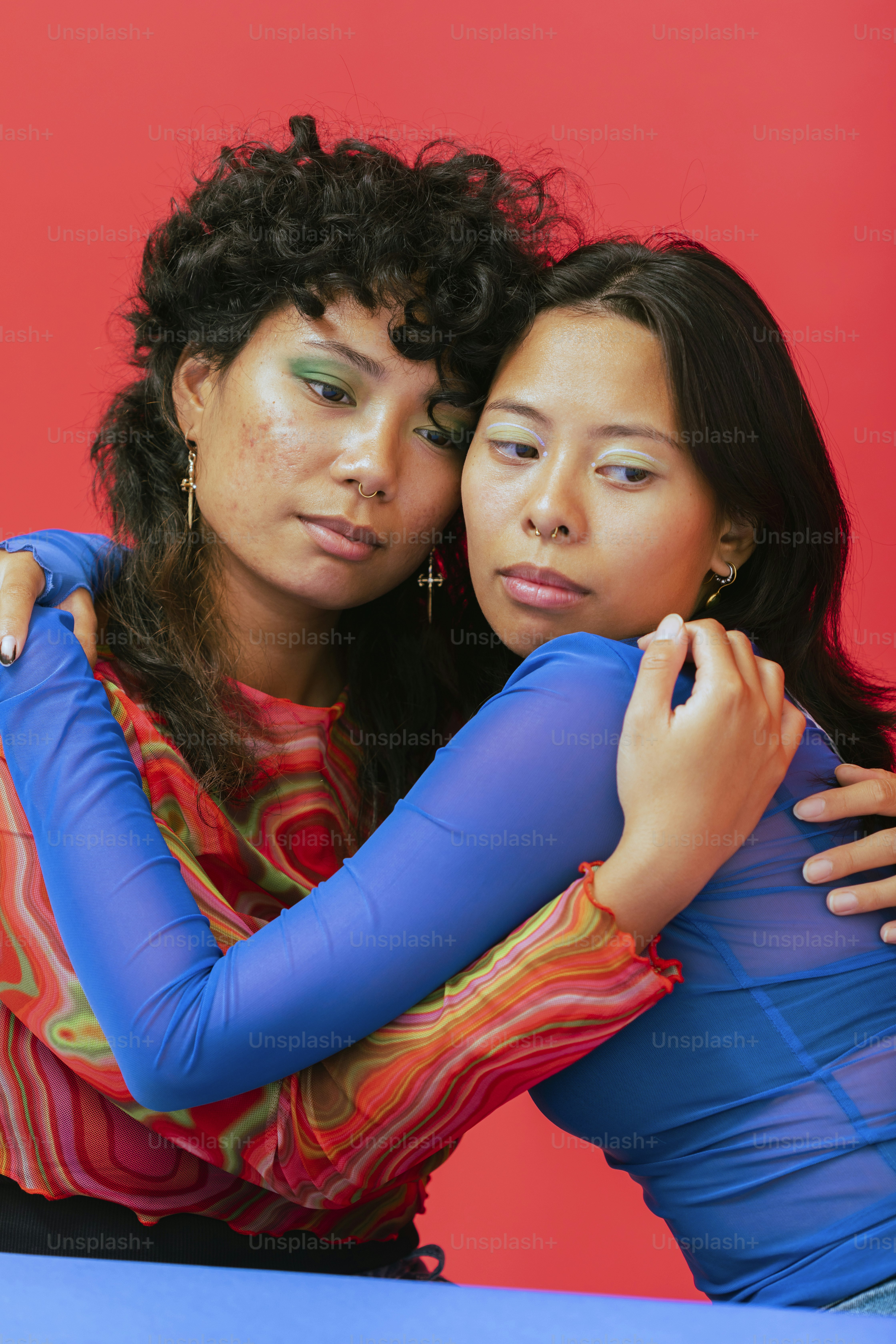 a couple of women posing for the camera