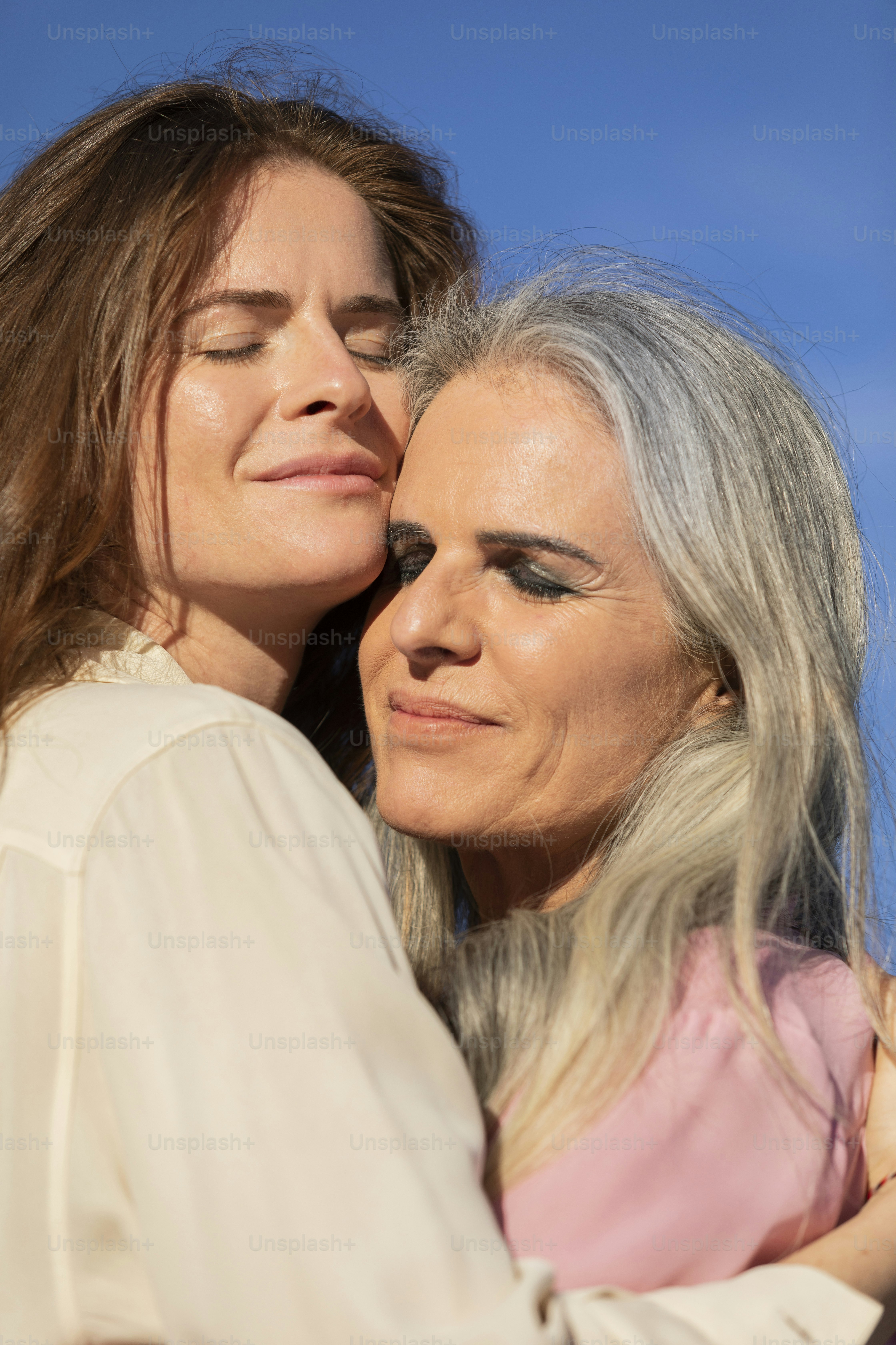 a woman kissing a man on the cheek