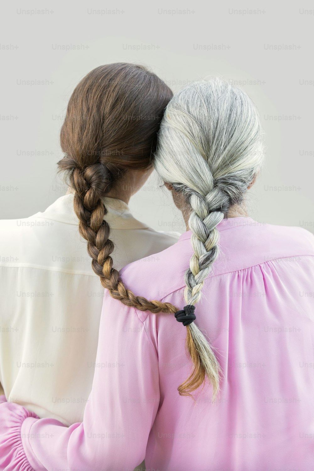 Red Ribbon Tied On Braided Hair High-Res Stock Photo - Getty Images