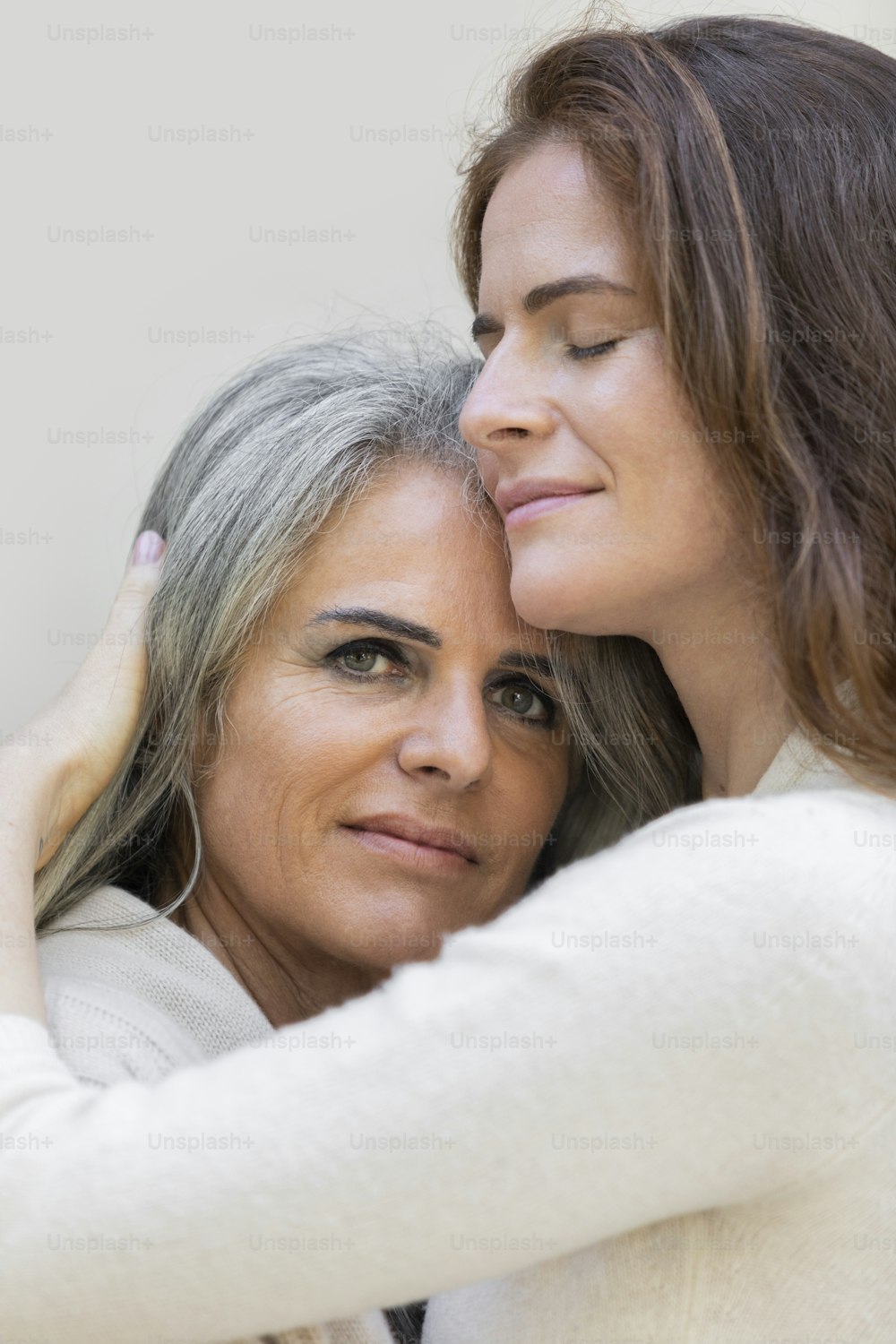 a woman hugging a man