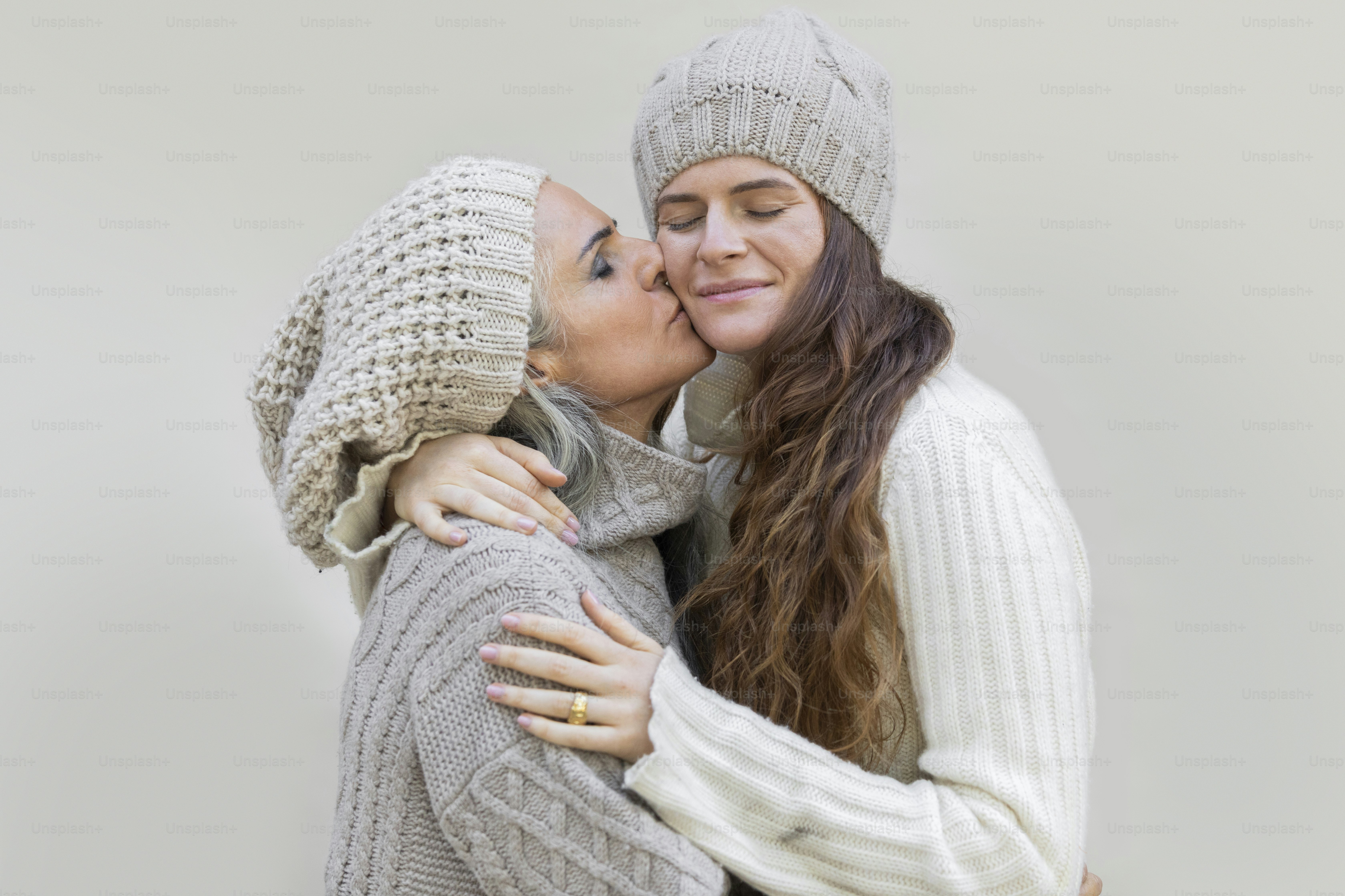 a woman hugging a man