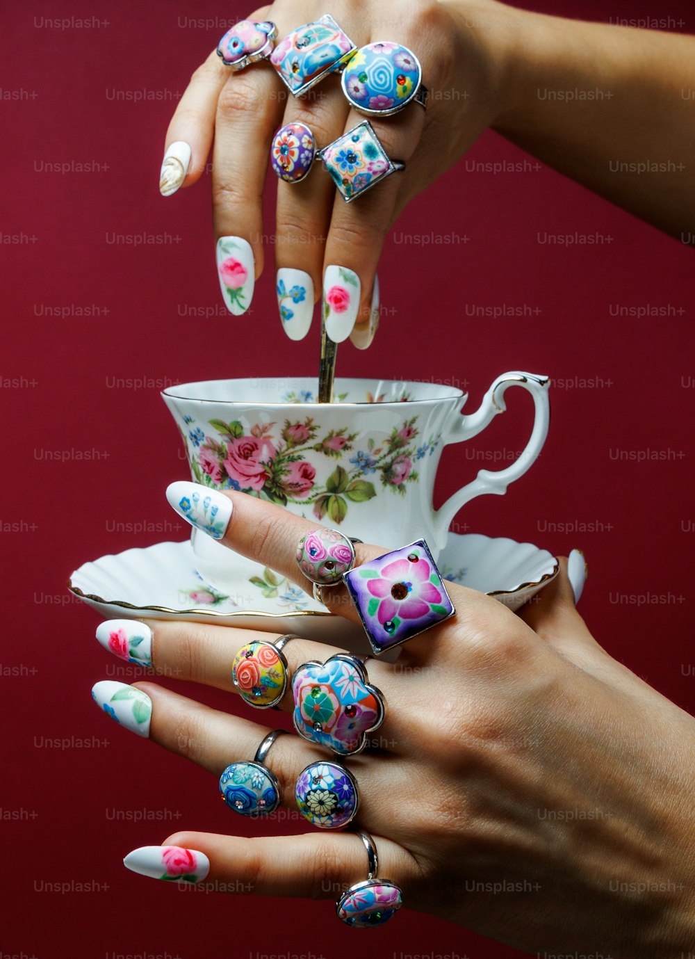 a person holding a tea cup