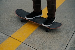 a person standing on a skateboard on a street