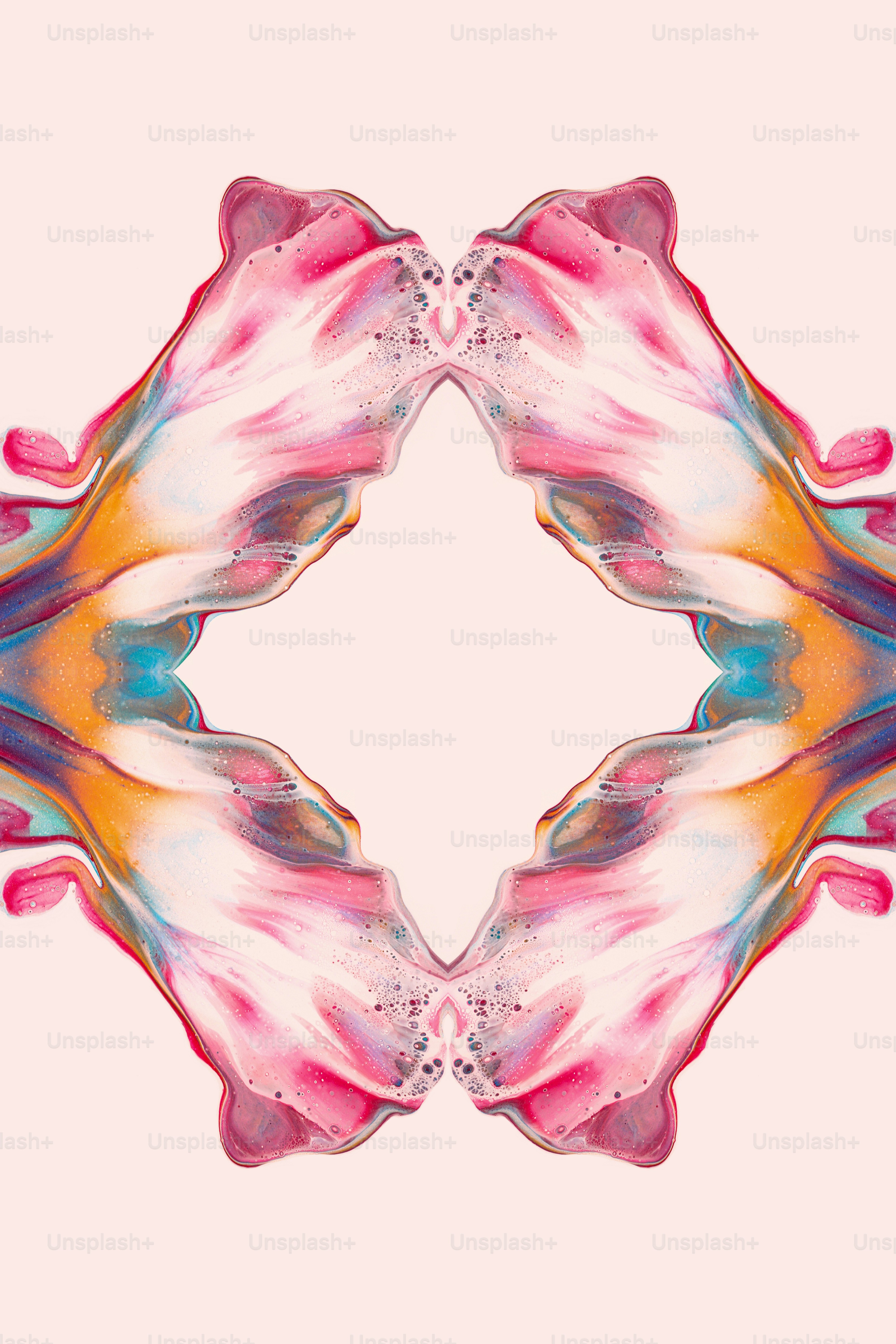 a pink, yellow, and blue pattern on a pink background