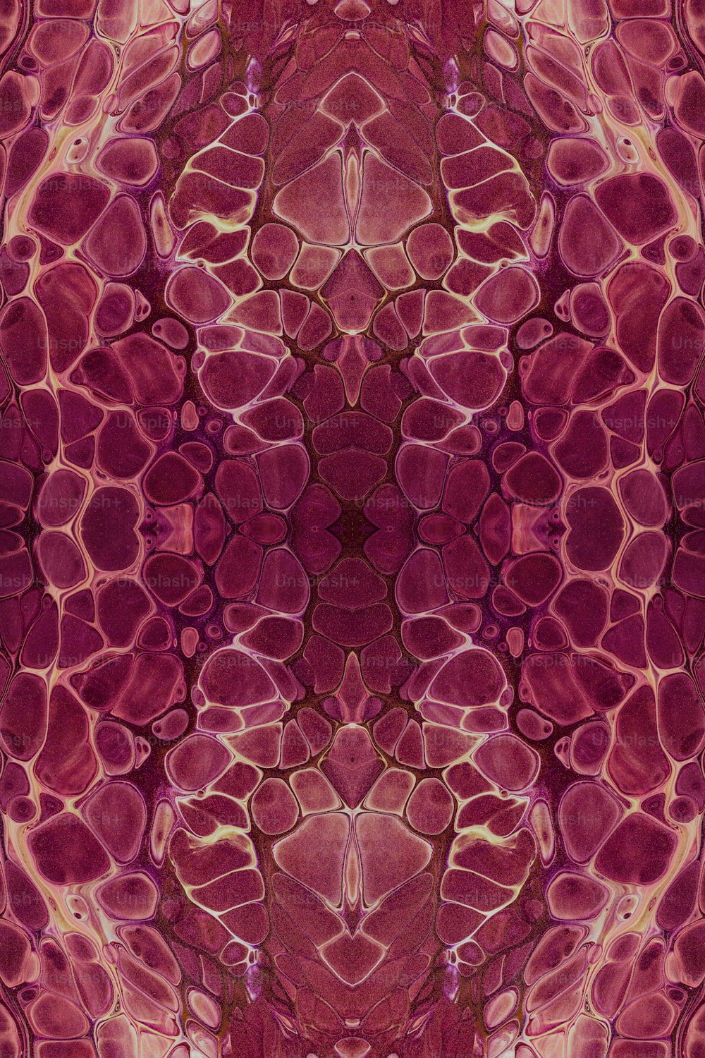 a red and pink abstract design with lots of bubbles