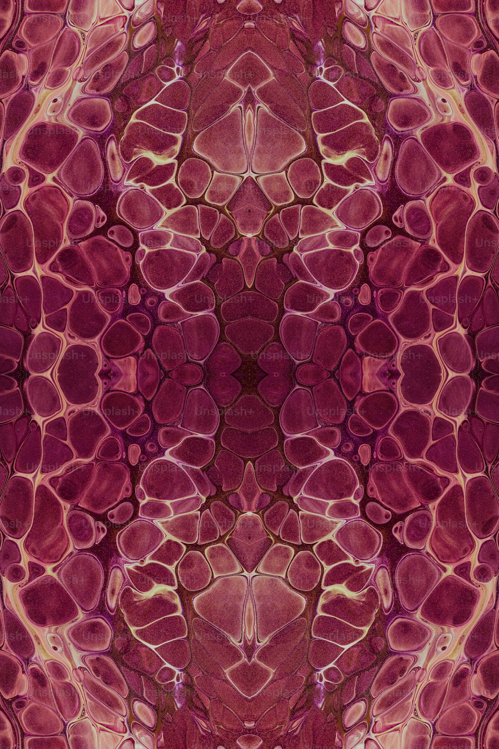 a red and pink abstract design with lots of bubbles