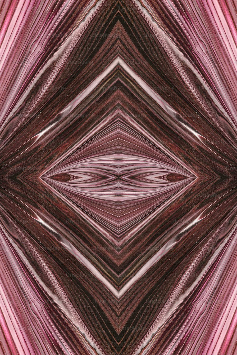 Una imagen de un patrón rosa y marrón